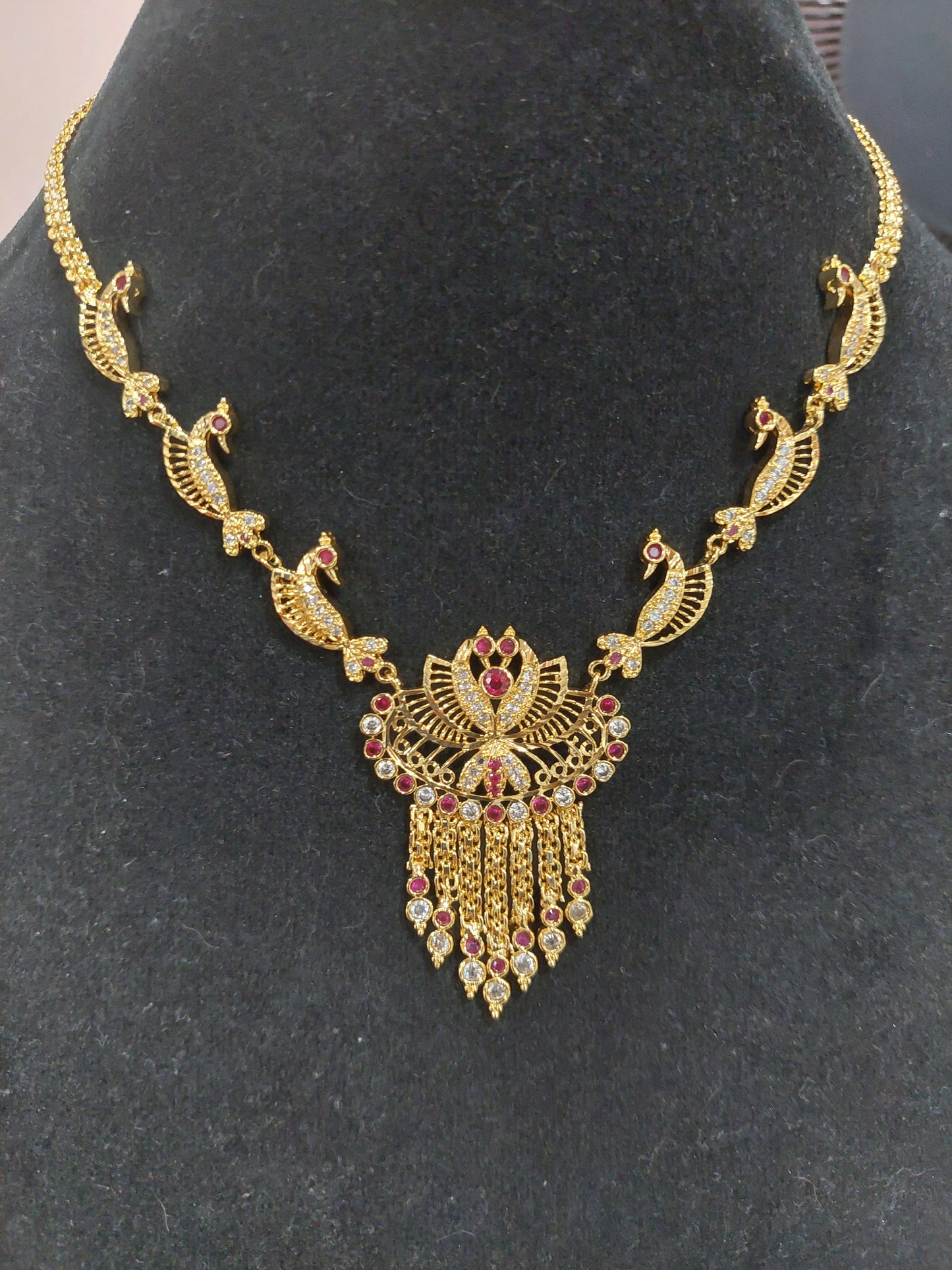 Micron plating peacock necklace with pair of earrings. Indian screw. Not 916 gold.