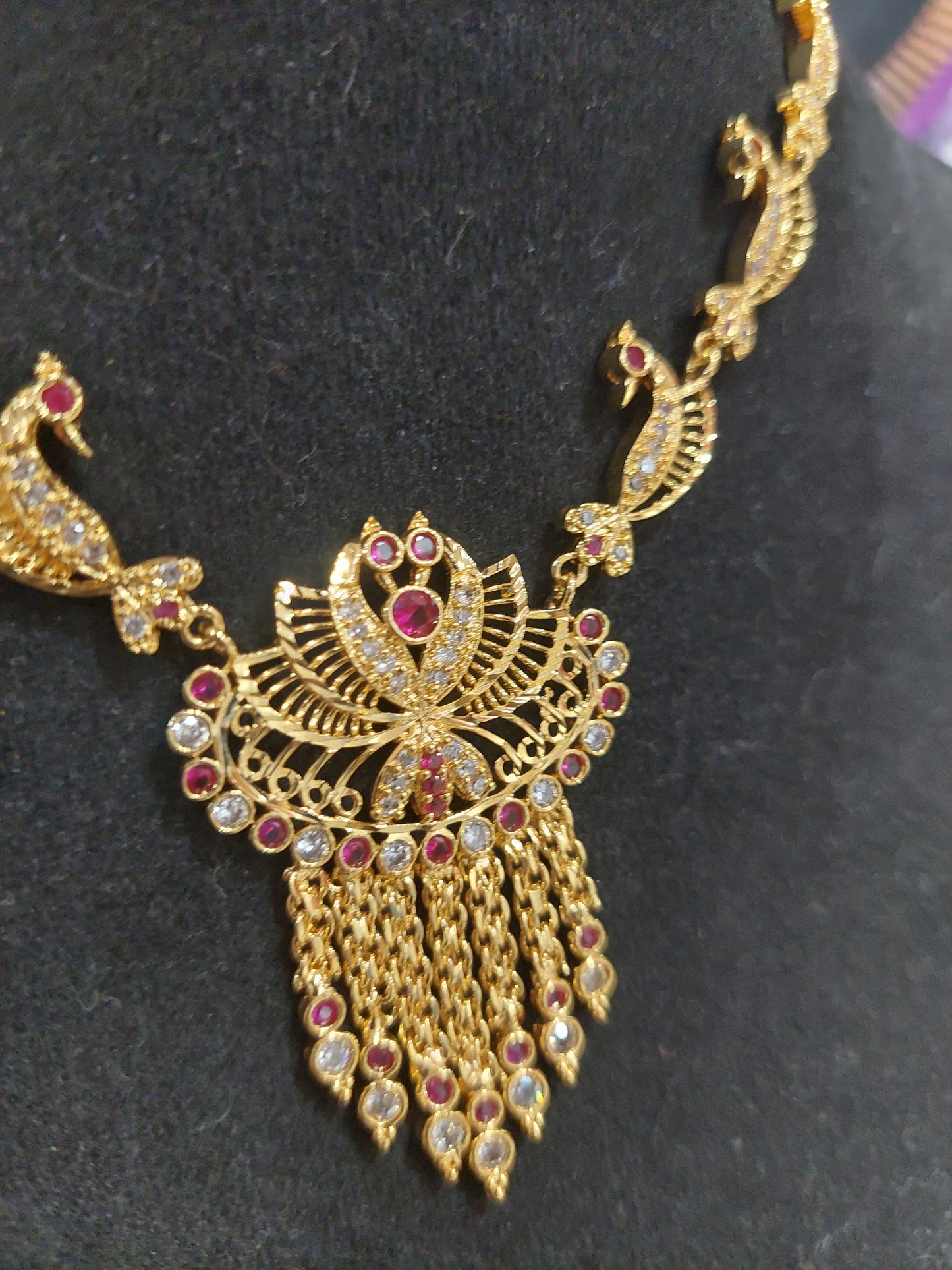 Micron plating peacock necklace with pair of earrings. Indian screw. Not 916 gold.