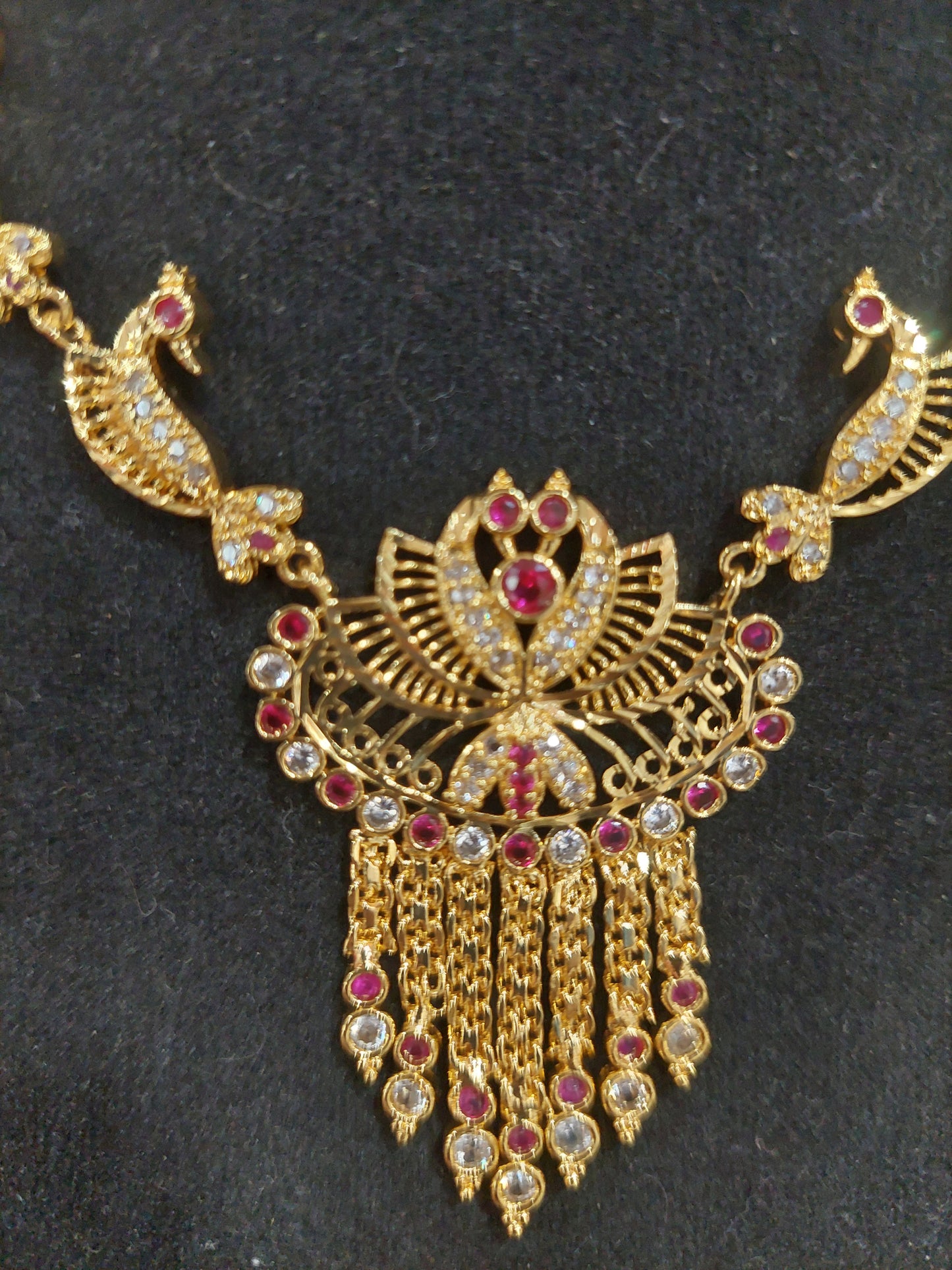 Micron plating peacock necklace with pair of earrings. Indian screw. Not 916 gold.