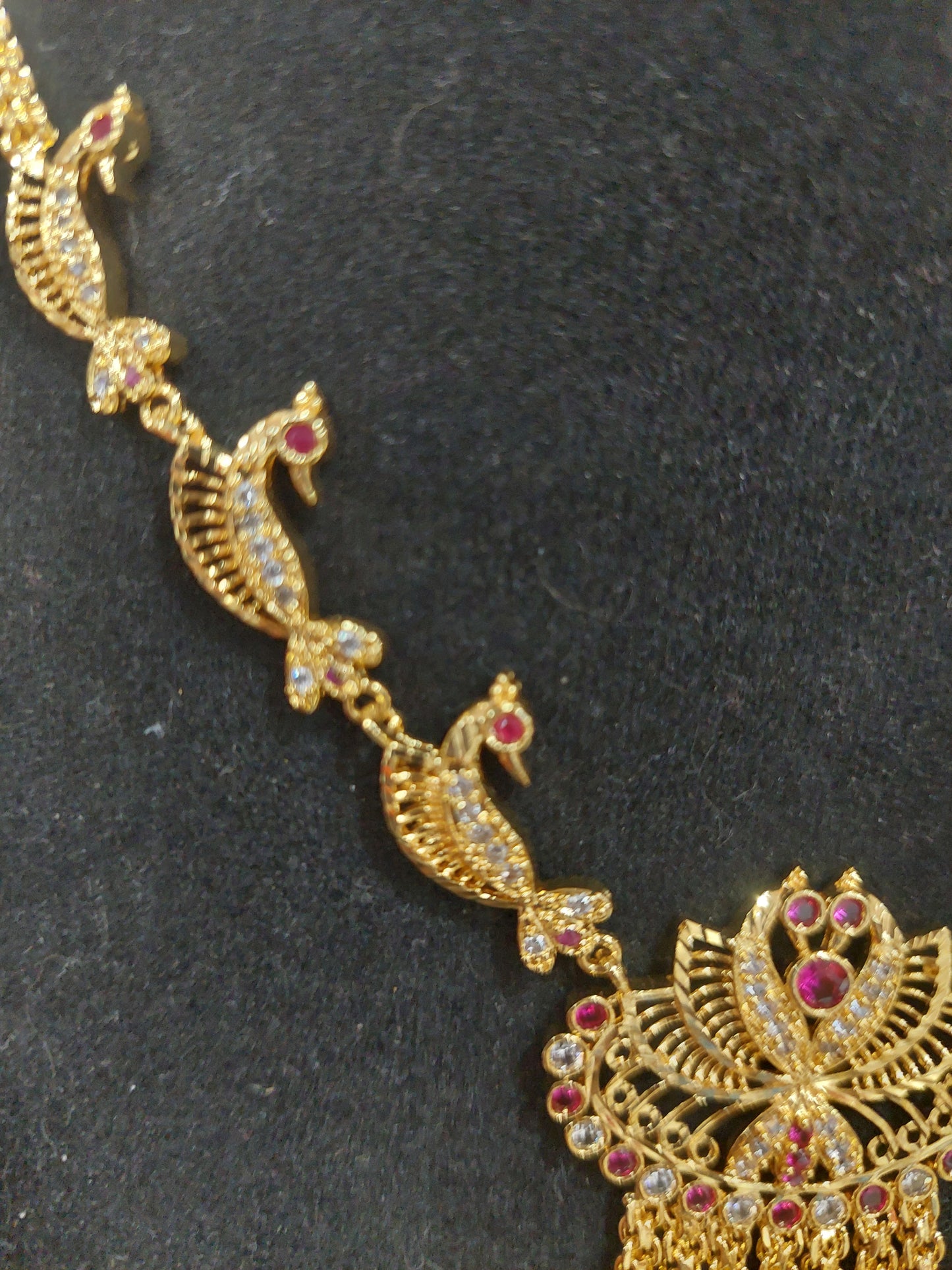 Micron plating peacock necklace with pair of earrings. Indian screw. Not 916 gold.