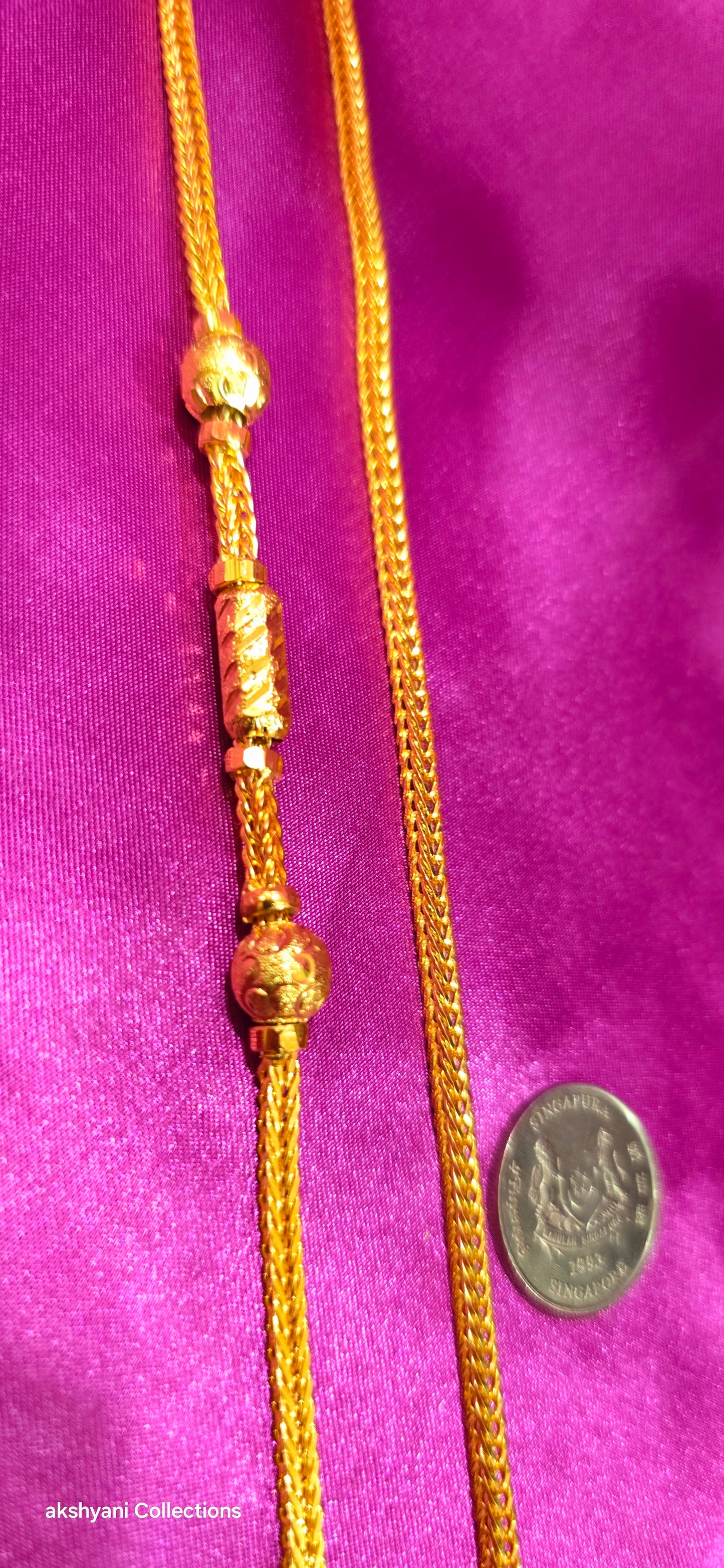 Not 916 gold. 24k electroplating items made in Singapore.  4 pawn thickness. Box chain .Daily wear.  Code 8811