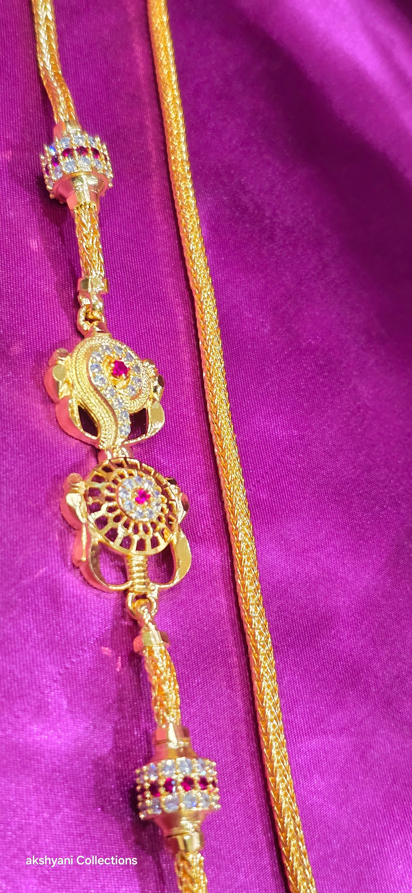 Sangu chakra thalikodi function wear type thalikodi.  Not 916 gold