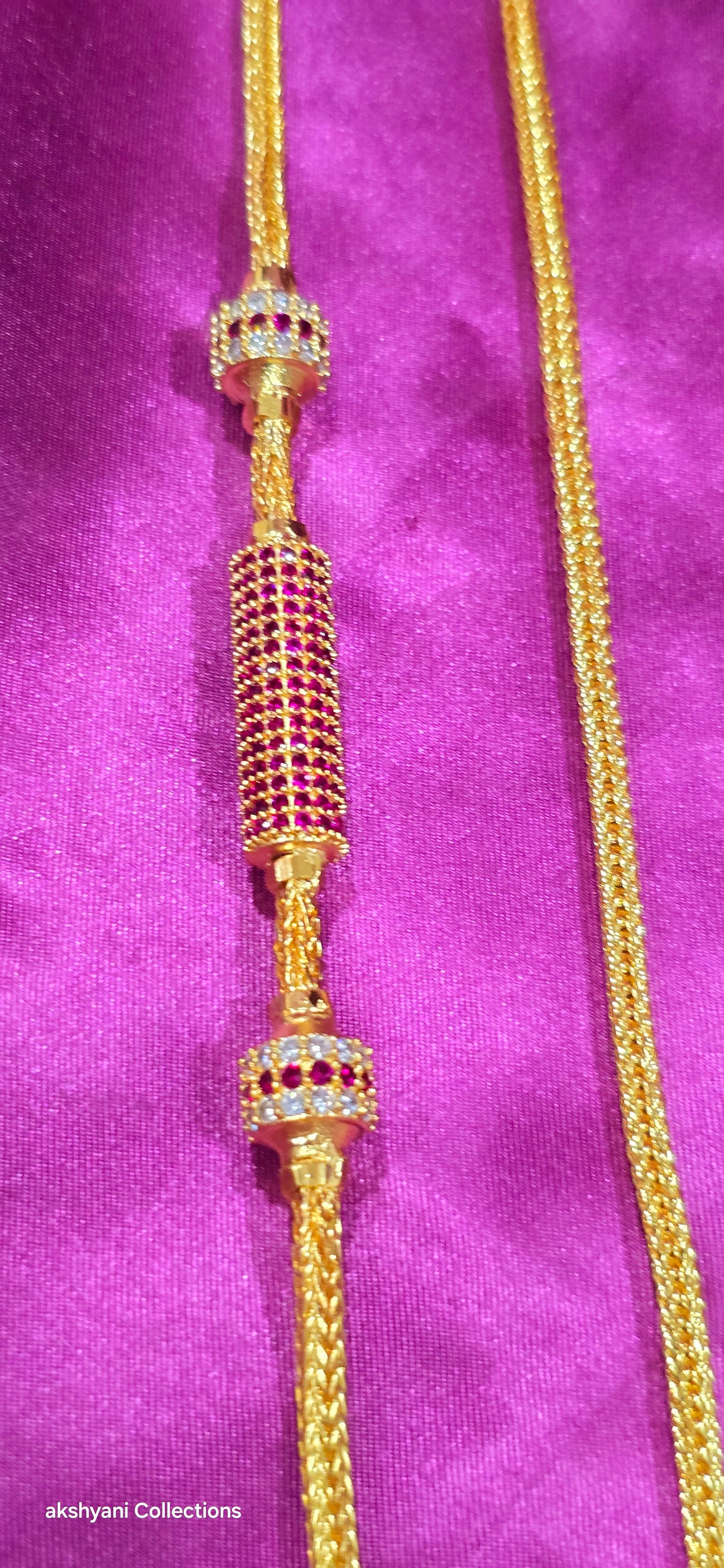 Ruby red function wear thalikodi .Not 916 gold