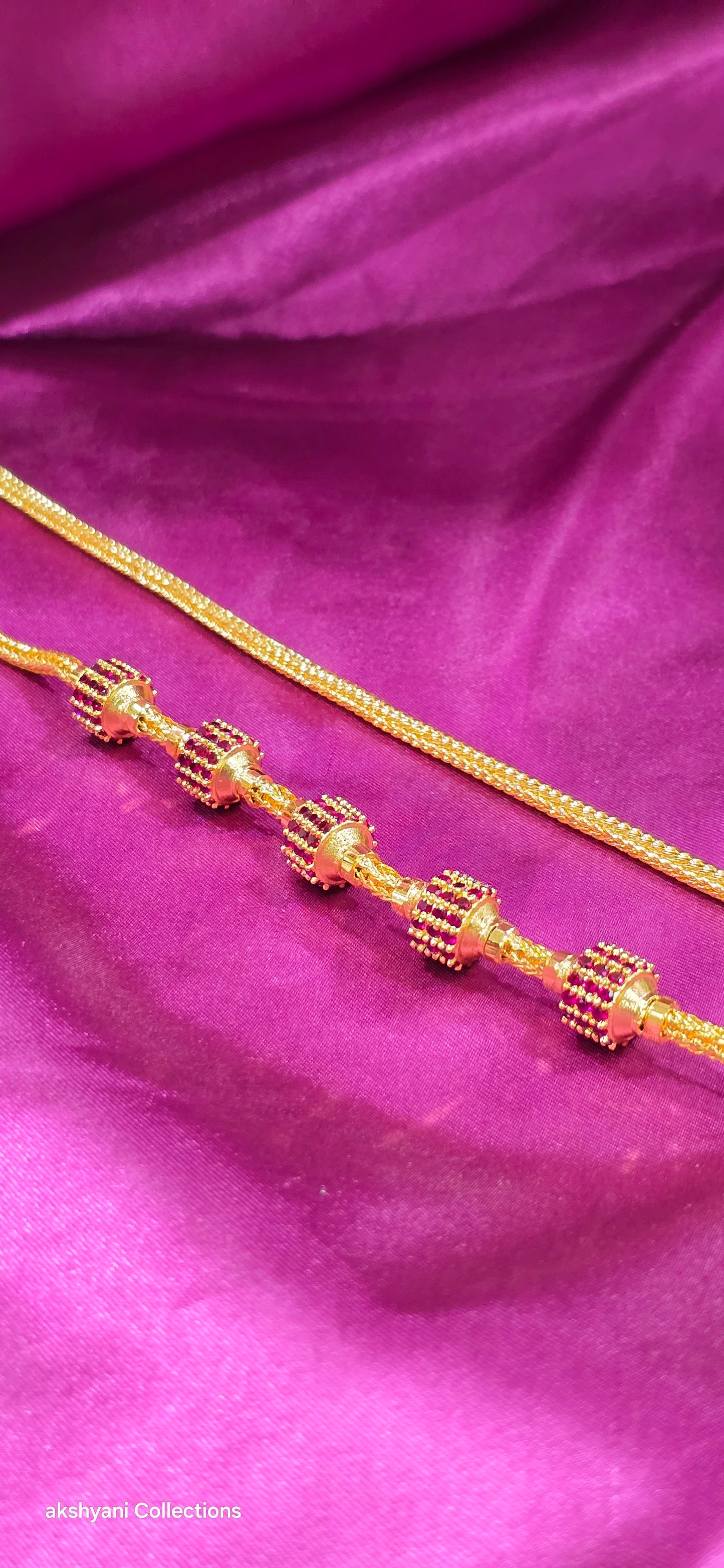 Ruby red function wear thalikodi .Not 916 gold