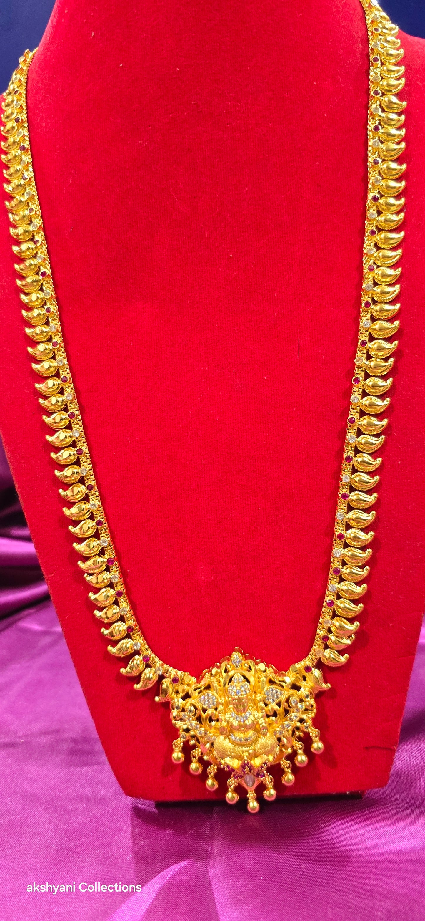 Mahalakshimi mango chain with red and white stones another majestic piece. NOT 916