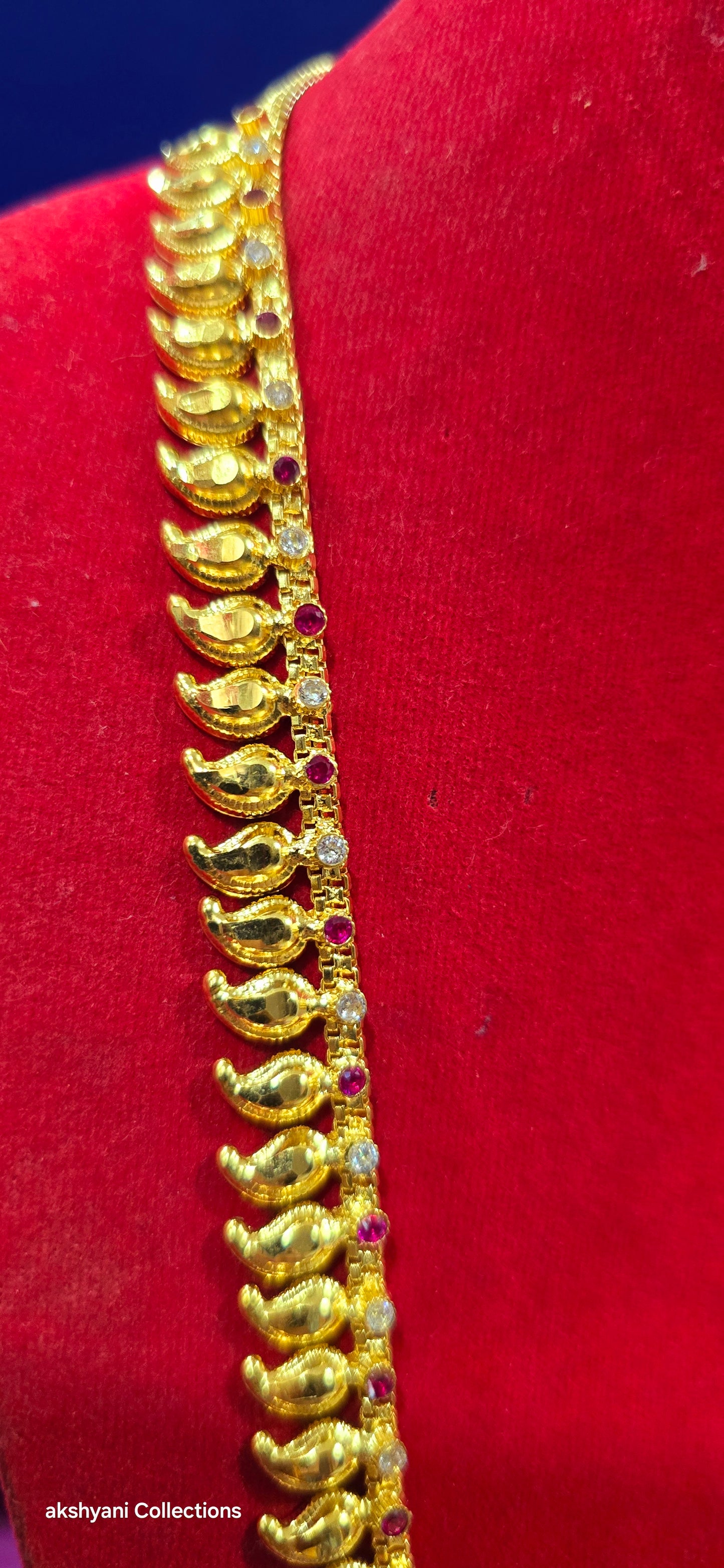 Mahalakshimi mango chain with red and white stones another majestic piece. NOT 916