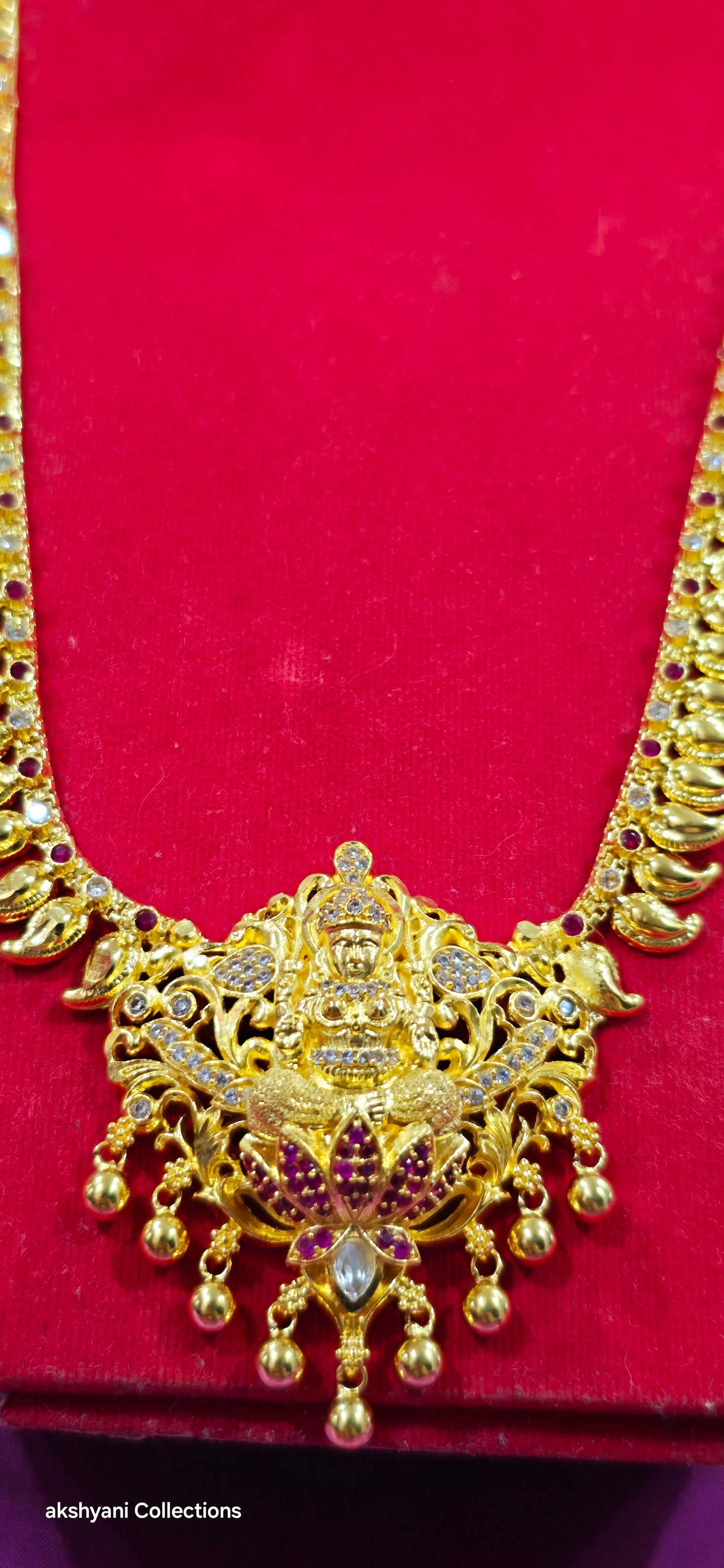 Mahalakshimi mango chain with red and white stones another majestic piece. NOT 916