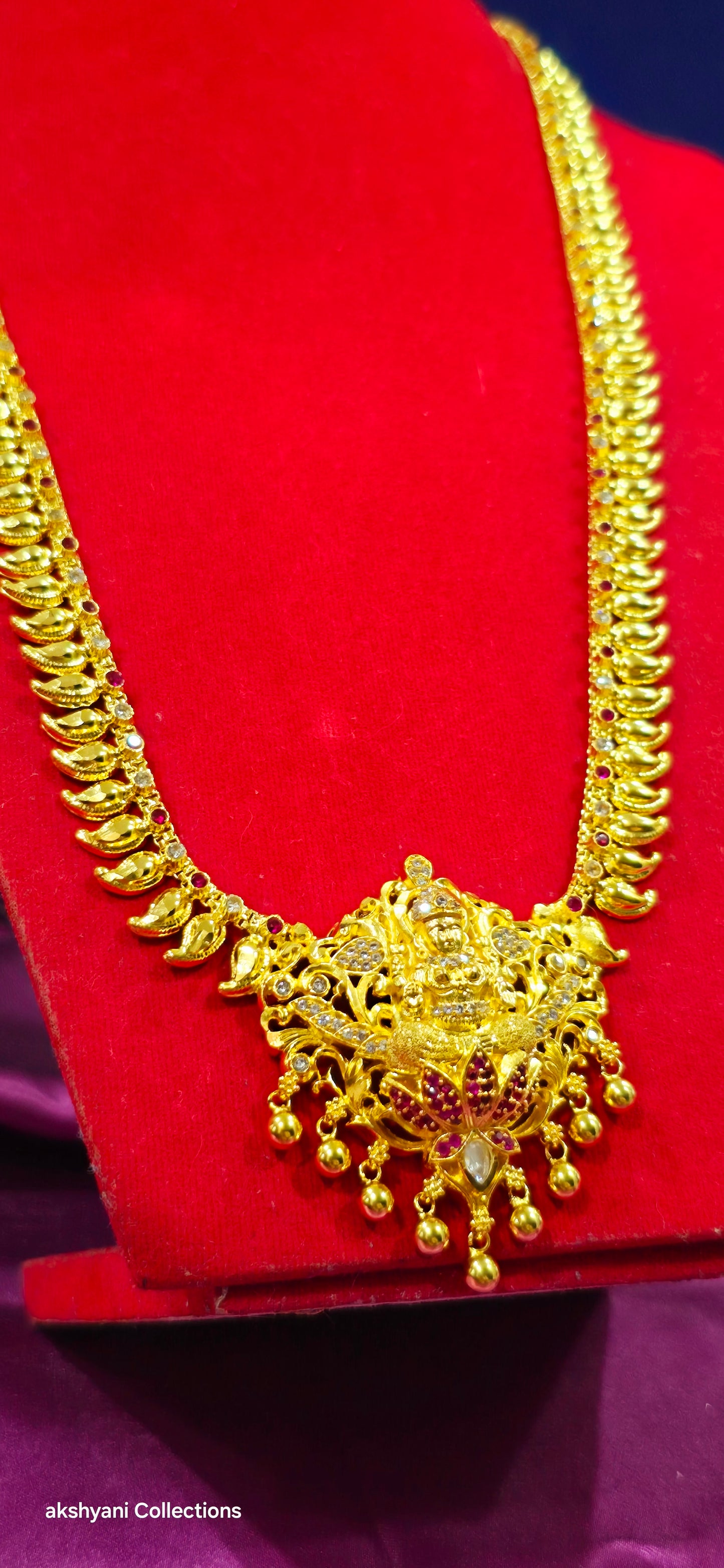 Mahalakshimi mango chain with red and white stones another majestic piece. NOT 916