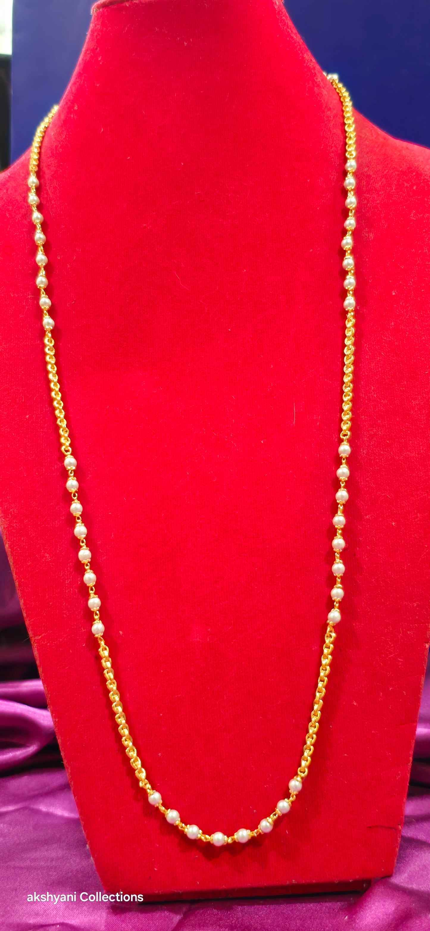 White beads with venthaya chain. Not 916 gold. Not suitable for shower