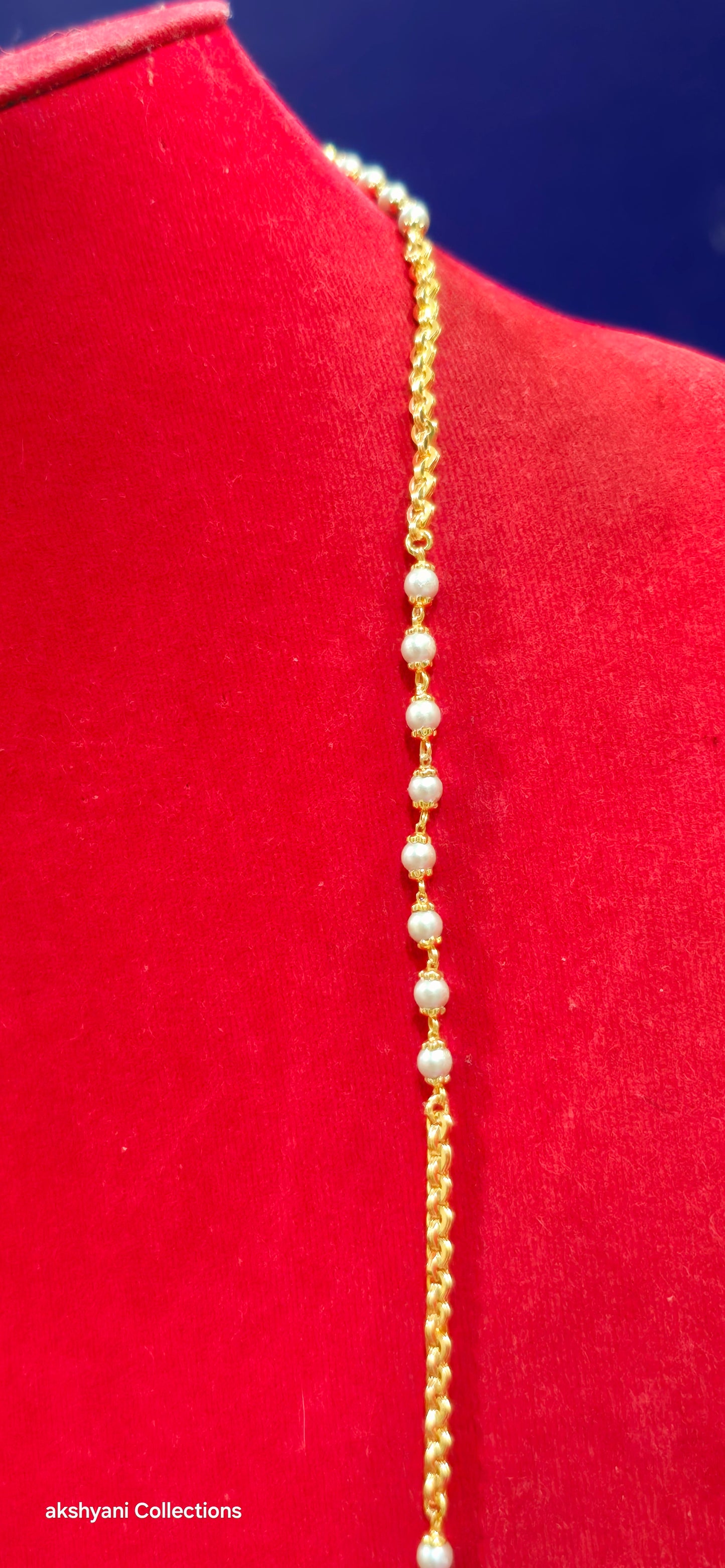 White beads with venthaya chain. Not 916 gold. Not suitable for shower