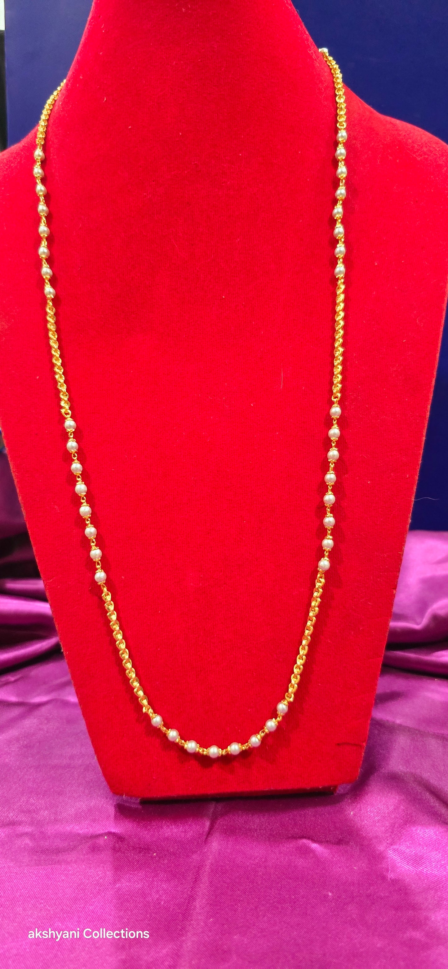 White beads with venthaya chain. Not 916 gold. Not suitable for shower