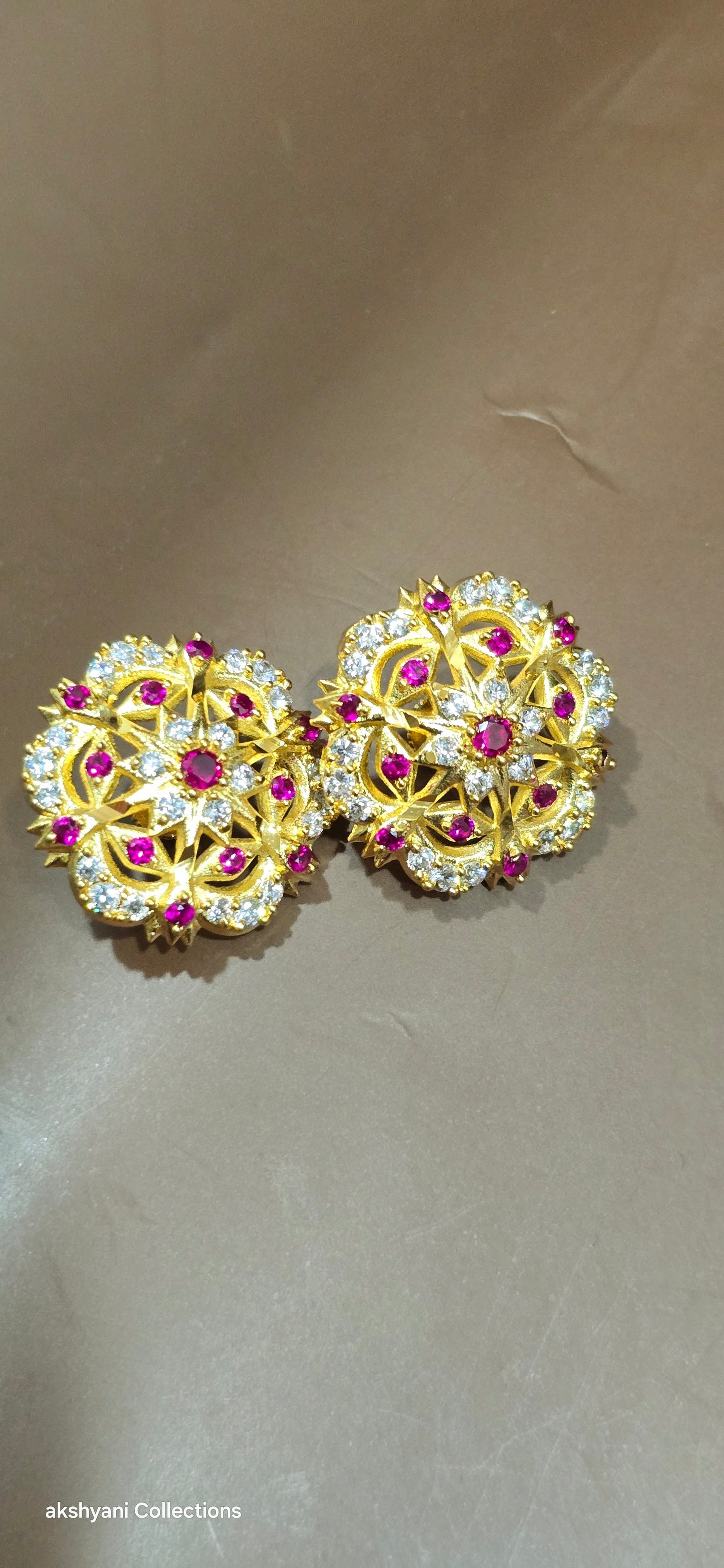 Diamond cut Ruby head earrings . Not 916gold.  Indian screw . Code 809