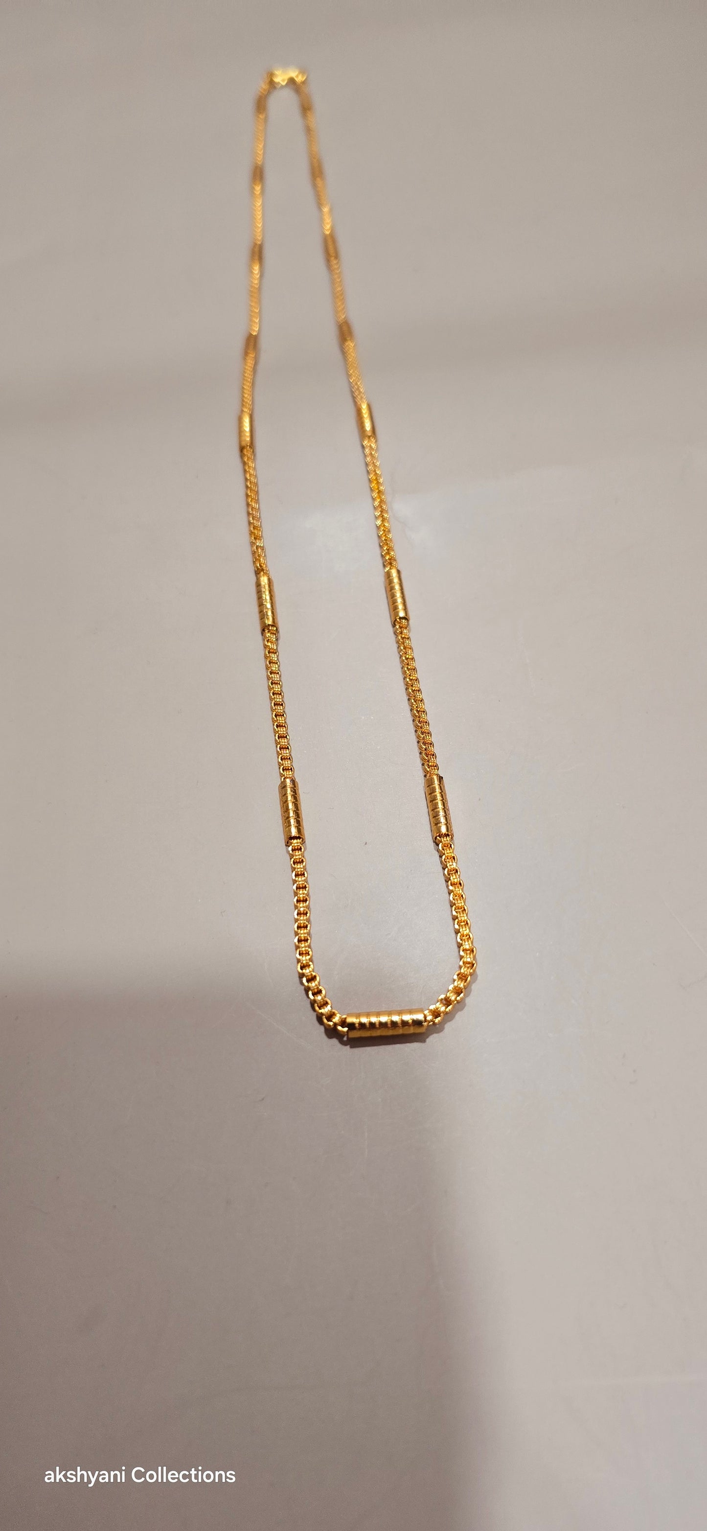 Not 916 gold. Daily wear chain. Code 7432. Length 26 inches. Not suitable for shower.