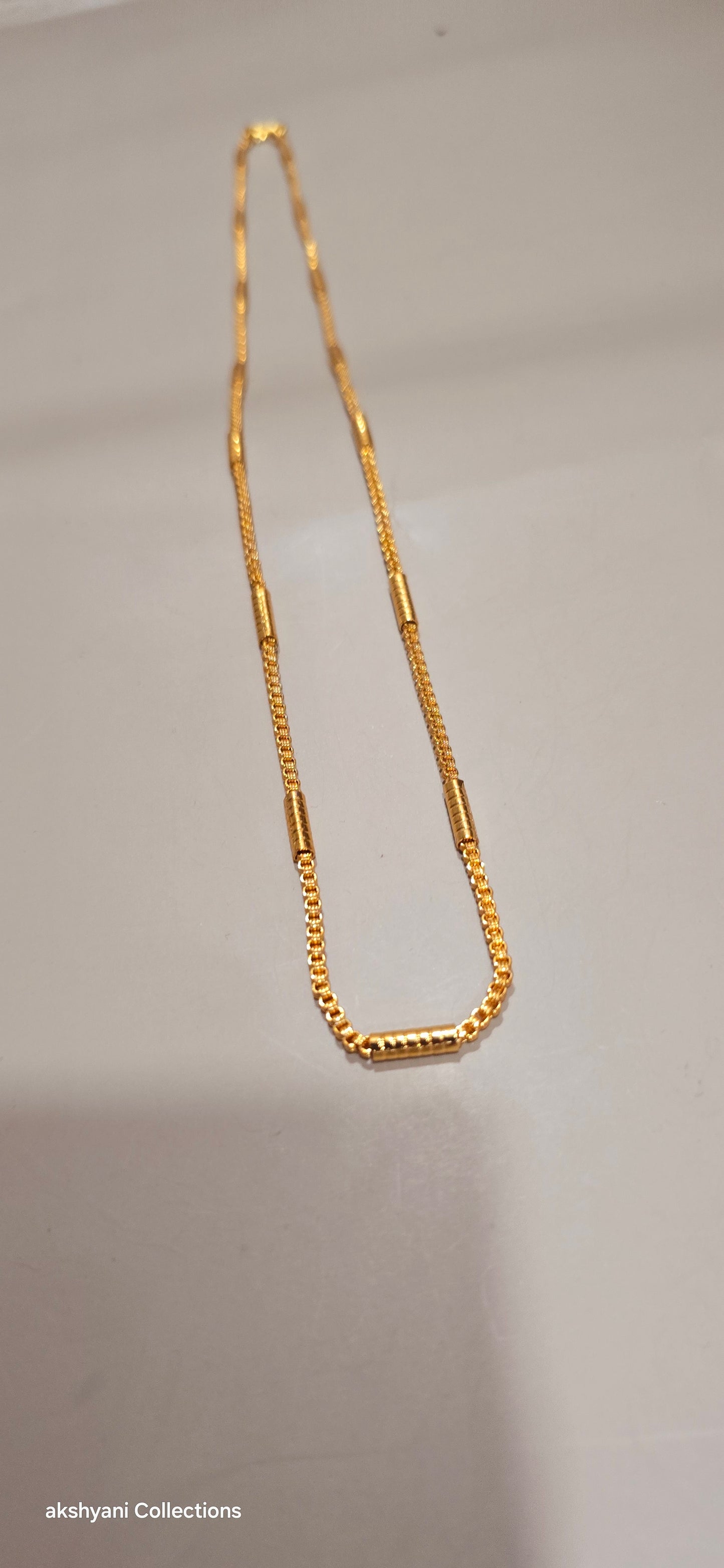 Not 916 gold. Daily wear chain. Code 7432. Length 26 inches. Not suitable for shower.