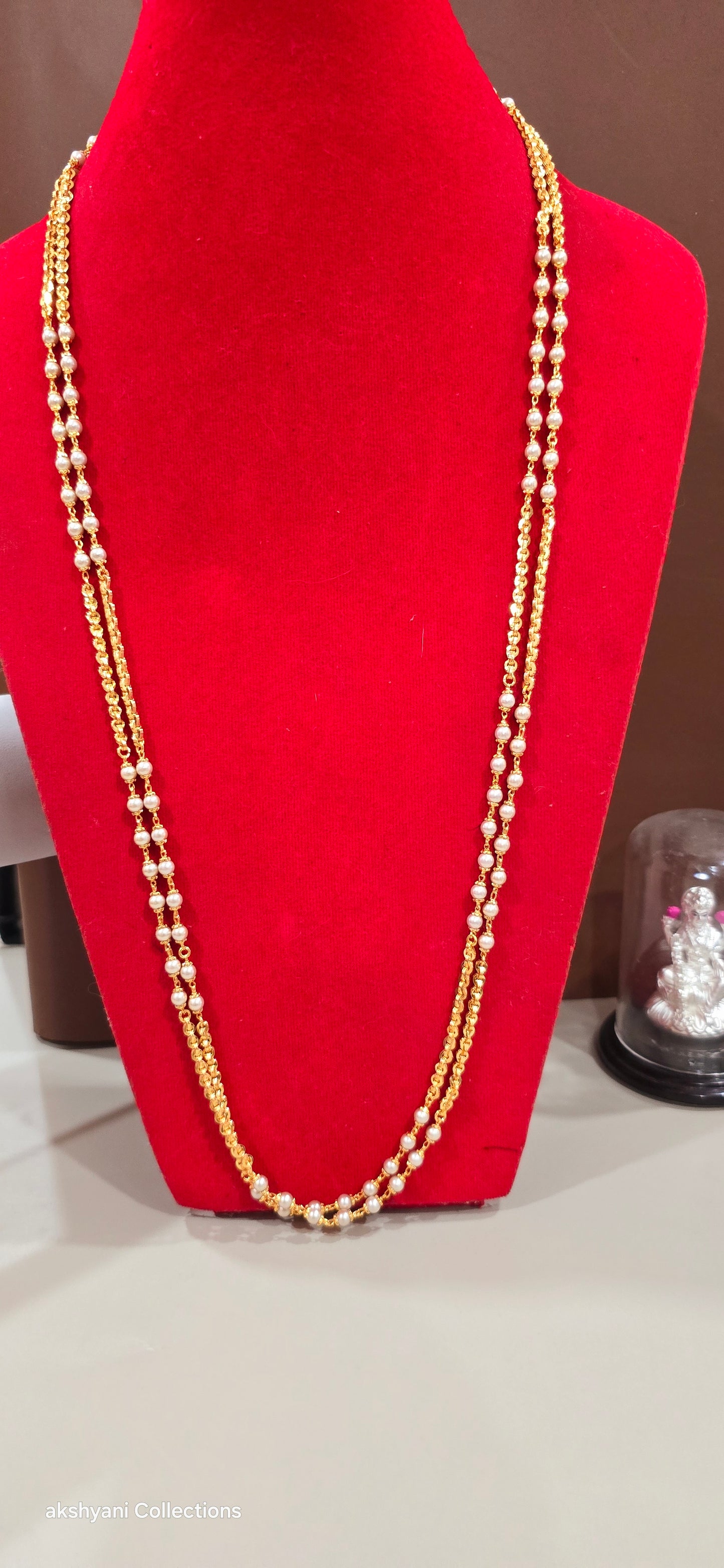 2 layer white pearls with zig zag cut chain.Not 916 gold.24k electroplating items made in Singapore.