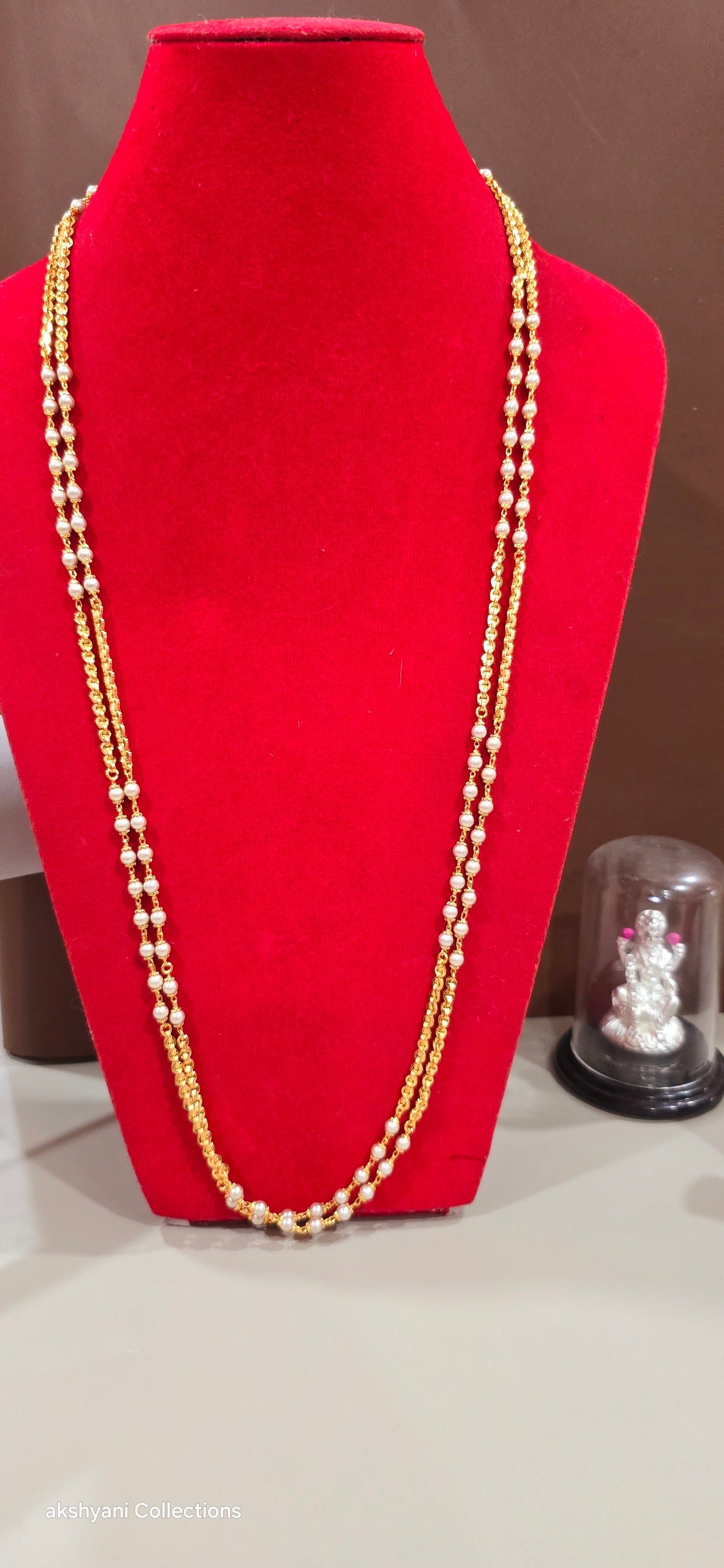 2 layer white pearls with zig zag cut chain.Not 916 gold.24k electroplating items made in Singapore.