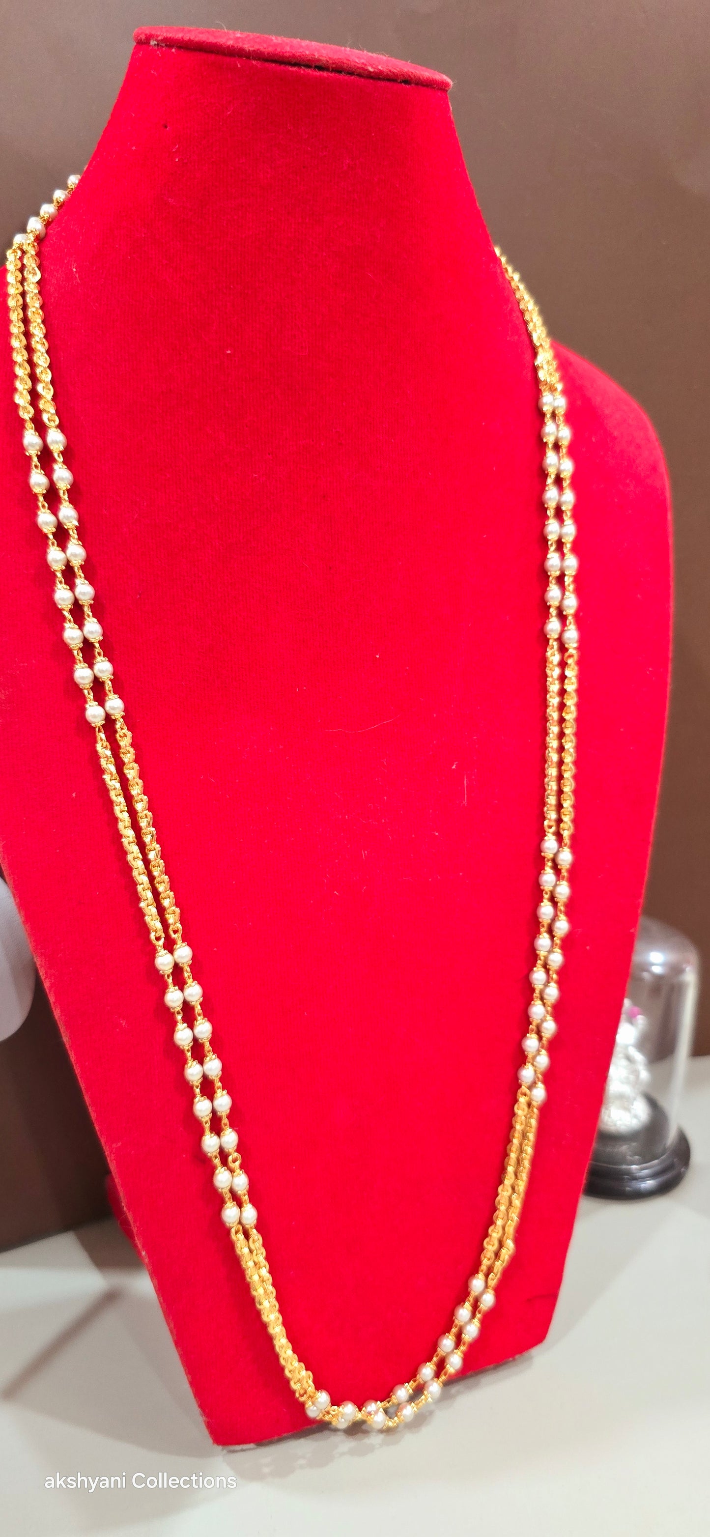 2 layer white pearls with zig zag cut chain.Not 916 gold.24k electroplating items made in Singapore.