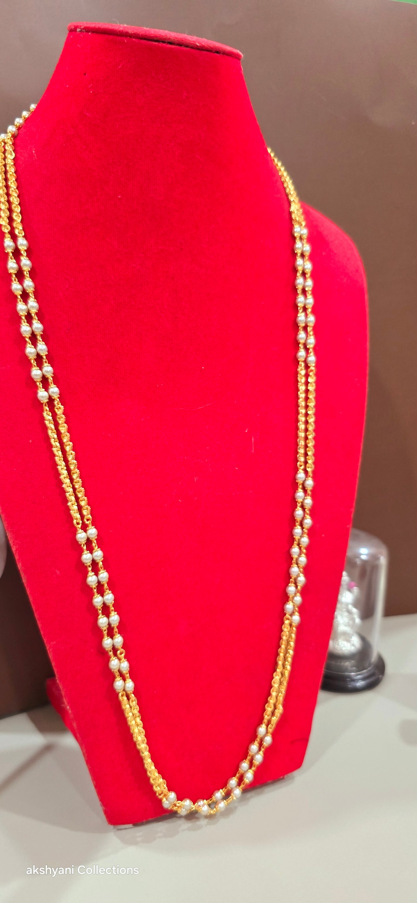 2 layer white pearls with zig zag cut chain.Not 916 gold.24k electroplating items made in Singapore.