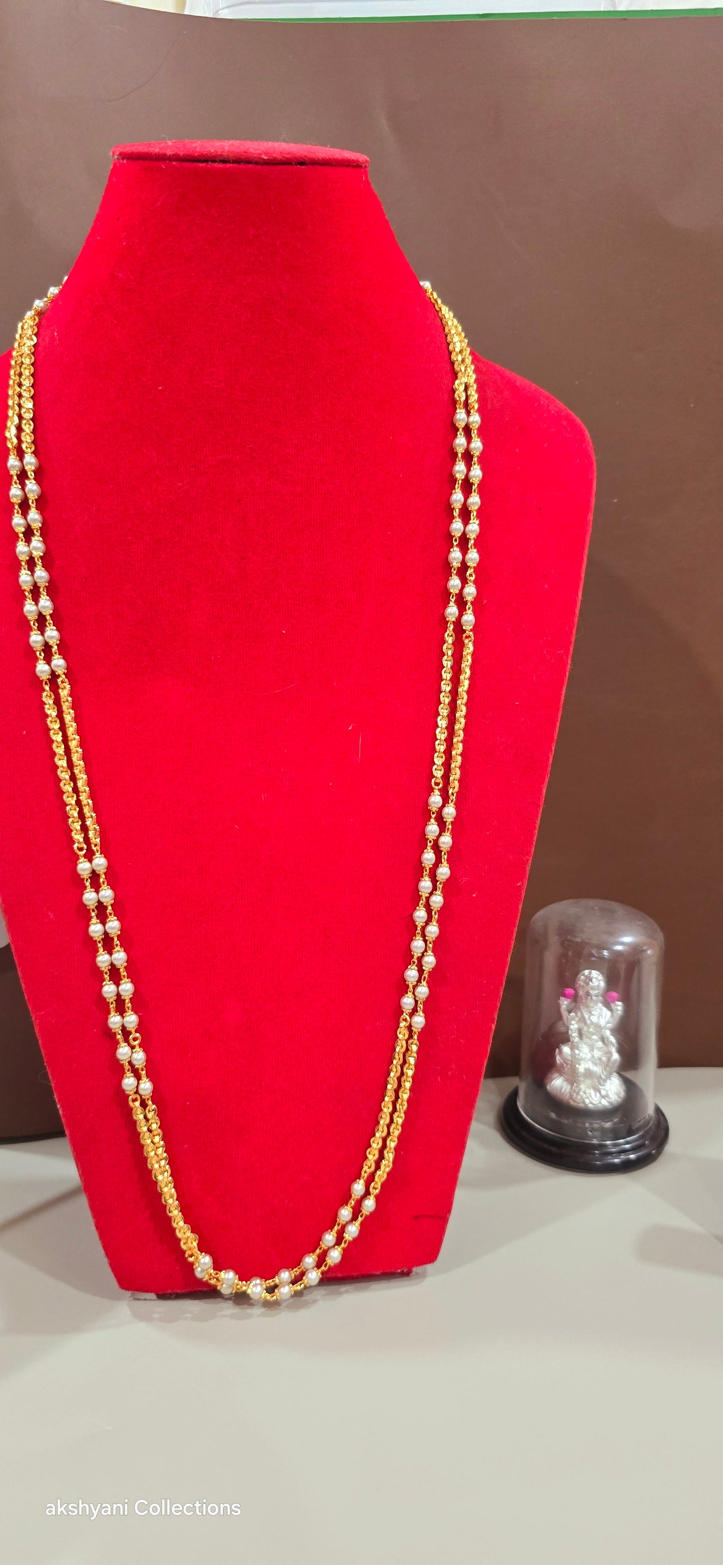 2 layer white pearls with zig zag cut chain.Not 916 gold.24k electroplating items made in Singapore.