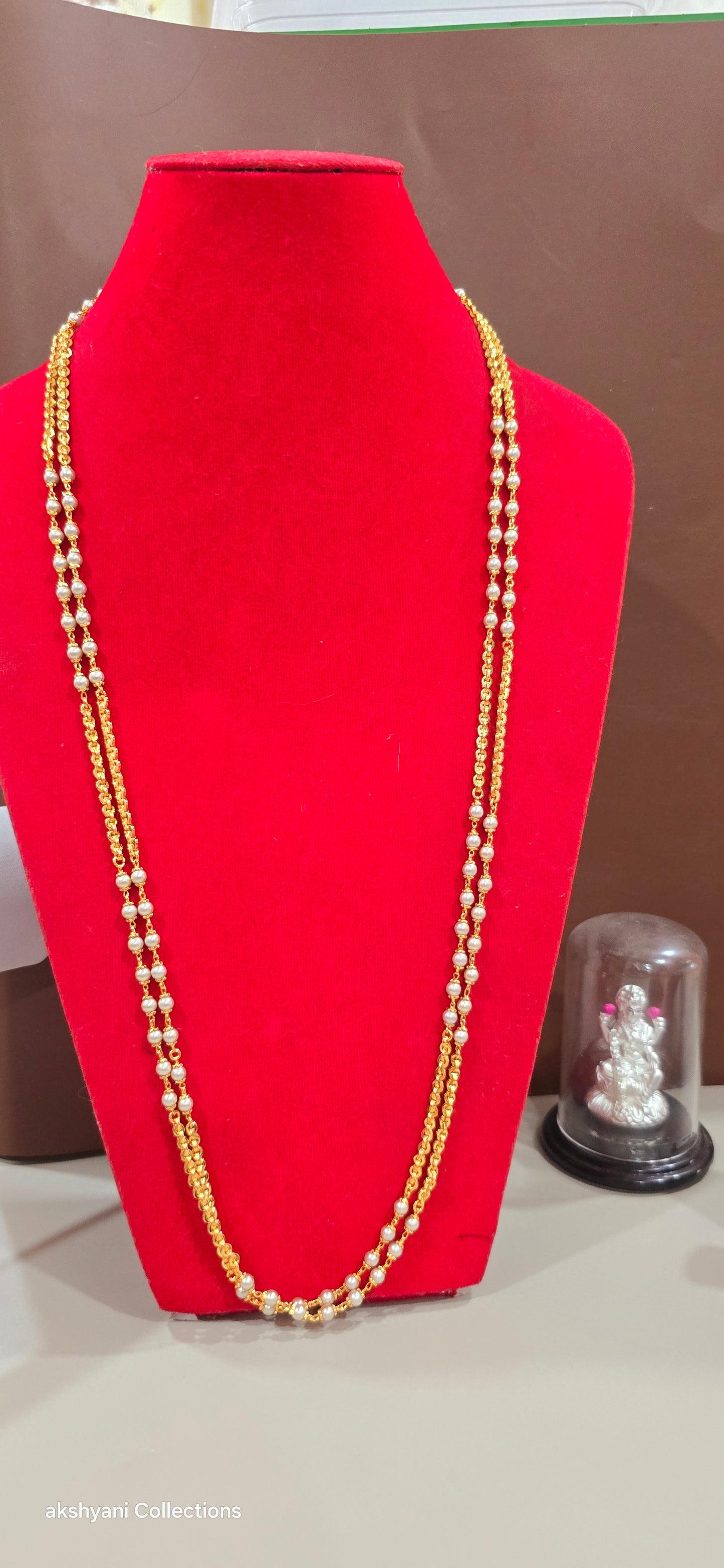 2 layer white pearls with zig zag cut chain.Not 916 gold.24k electroplating items made in Singapore.