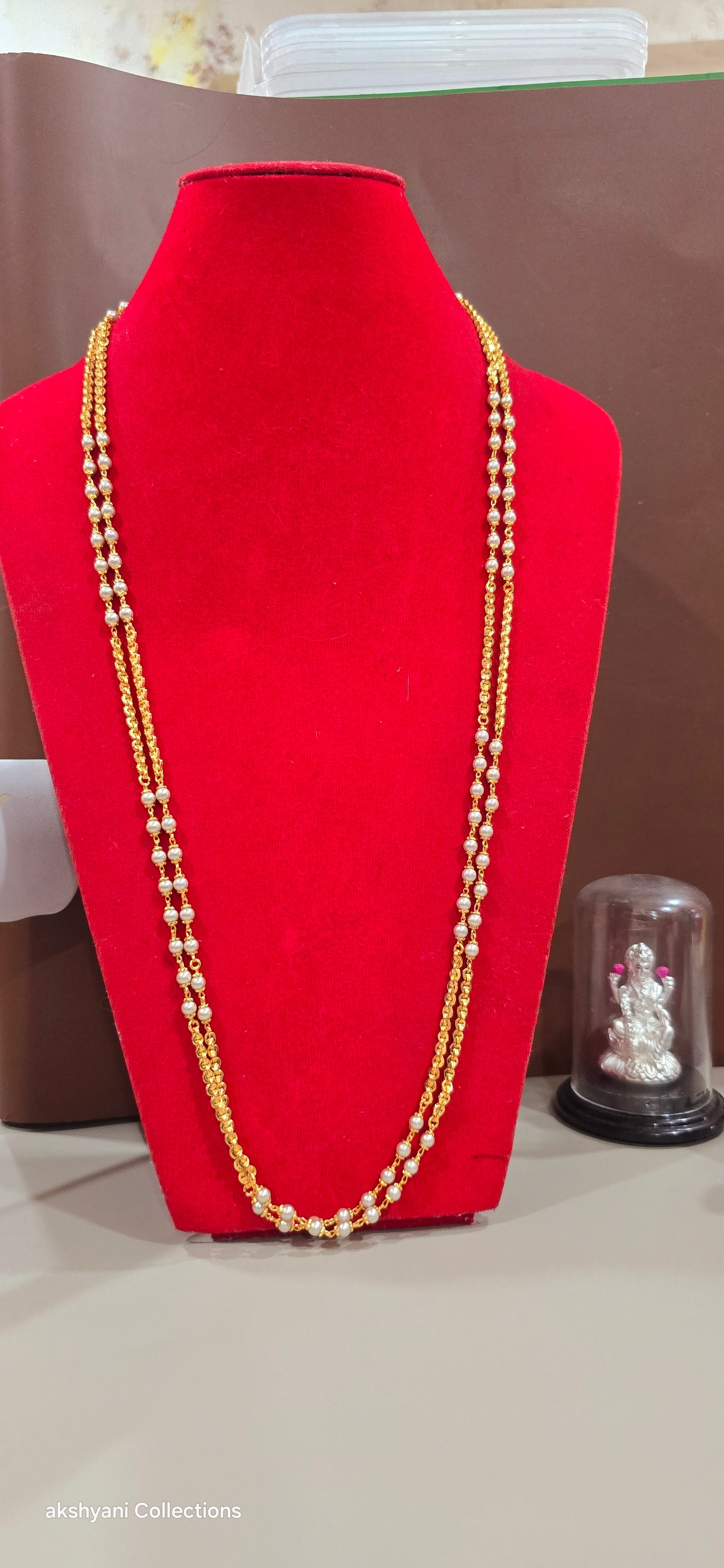 2 layer white pearls with zig zag cut chain.Not 916 gold.24k electroplating items made in Singapore.