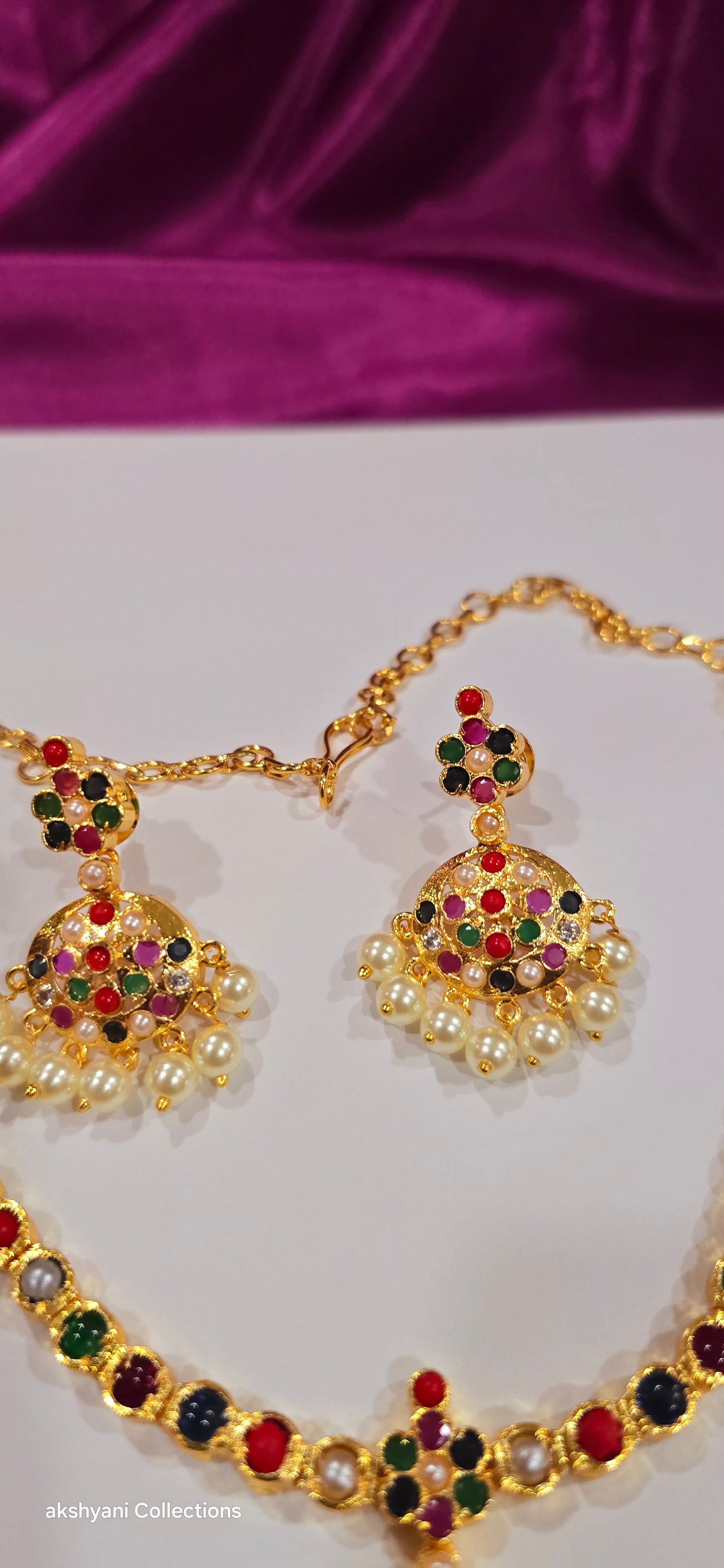 Navaratna set with earrings.  Functionwear type of jewellery.  Not 916