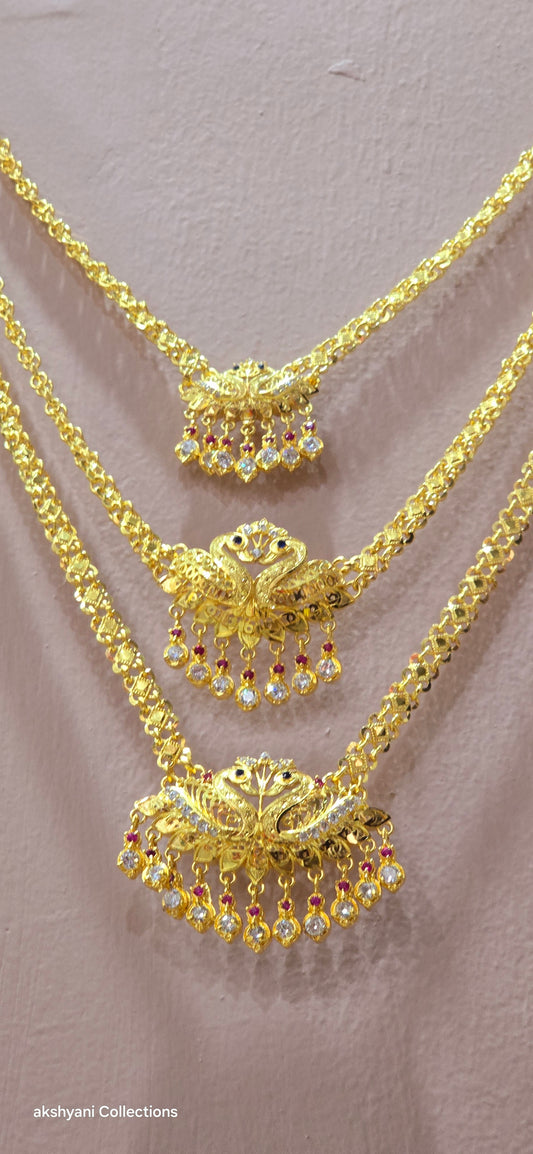 3 layer pendent chain not 916 gold. 28 inches length with decked peacock brooch. Code 808A.