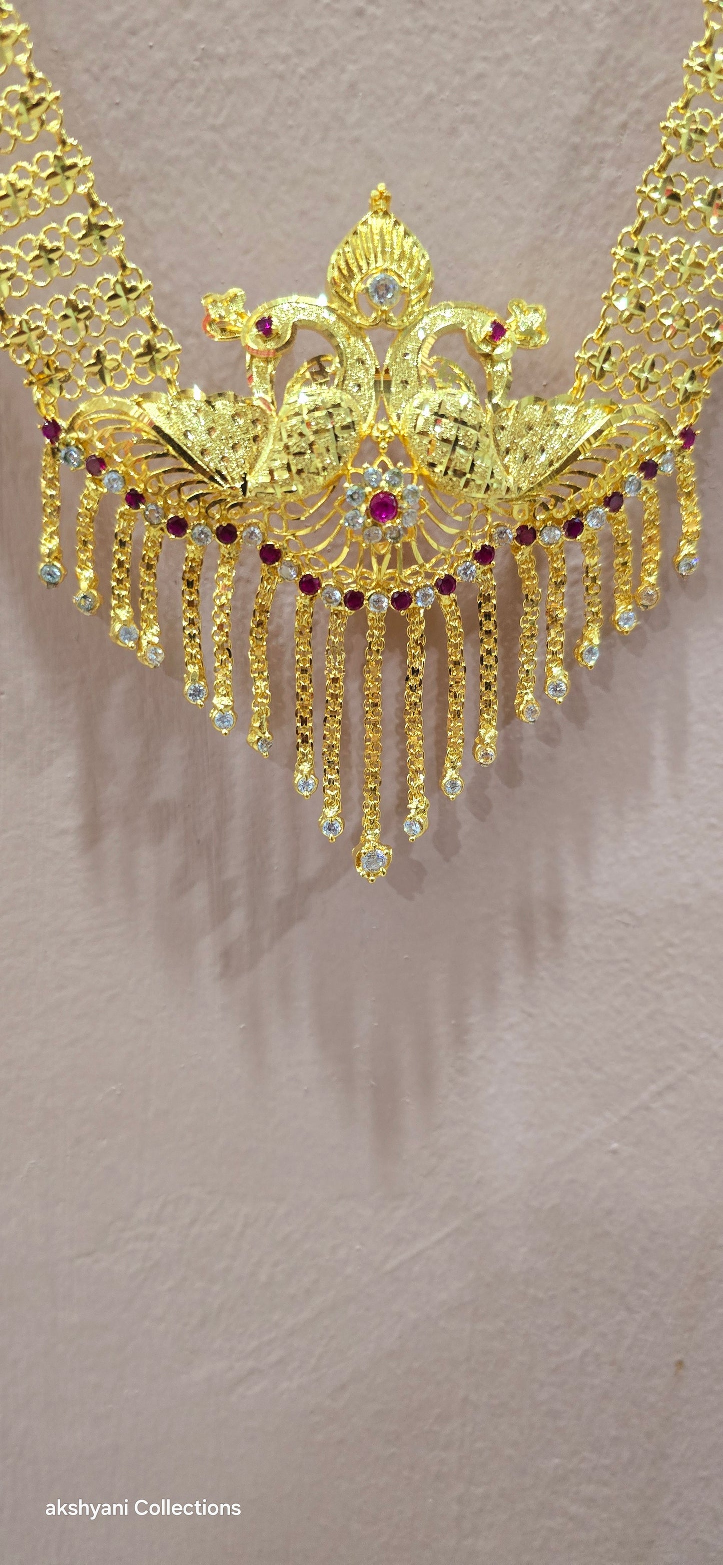 Peacock maalai.Not 916 gold. 30 inches in length.
