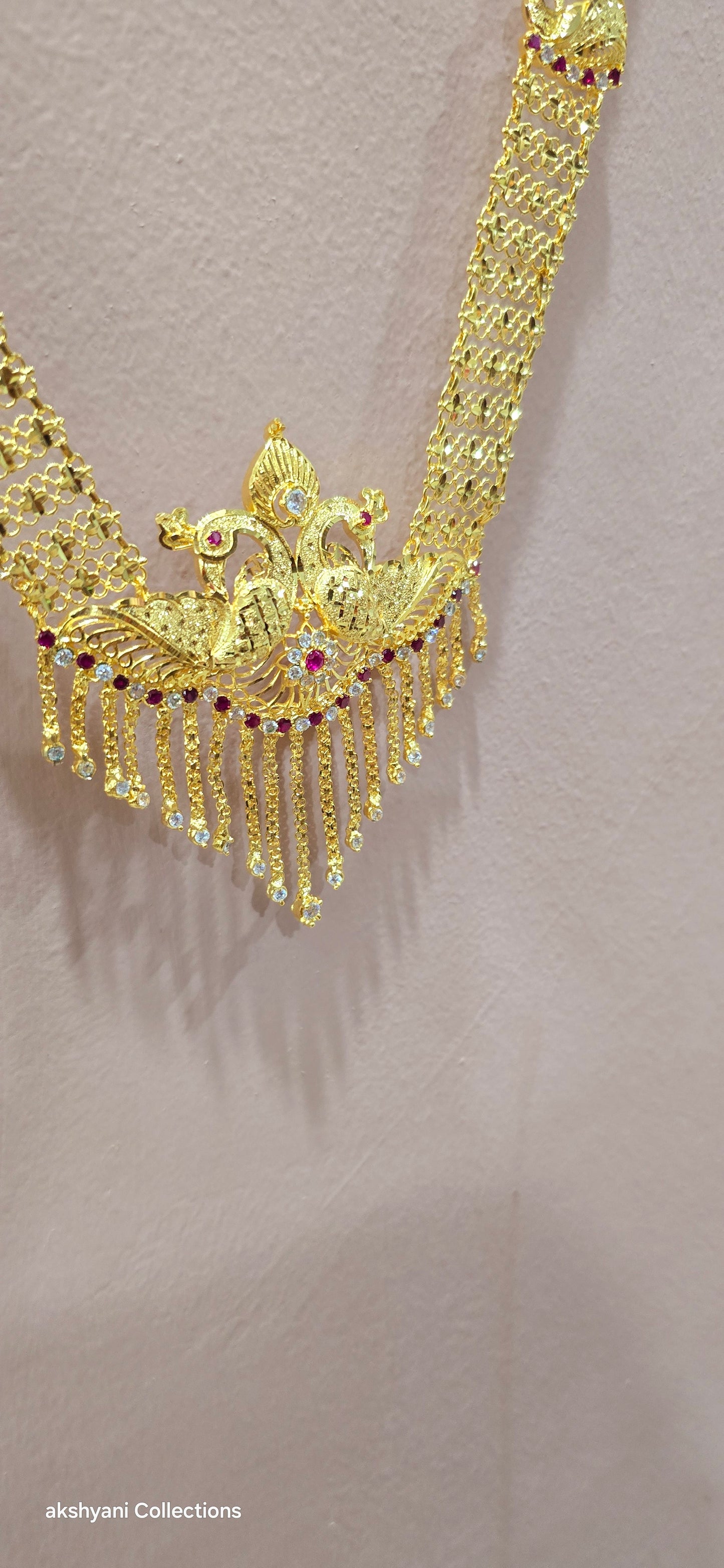 Peacock maalai.Not 916 gold. 30 inches in length.