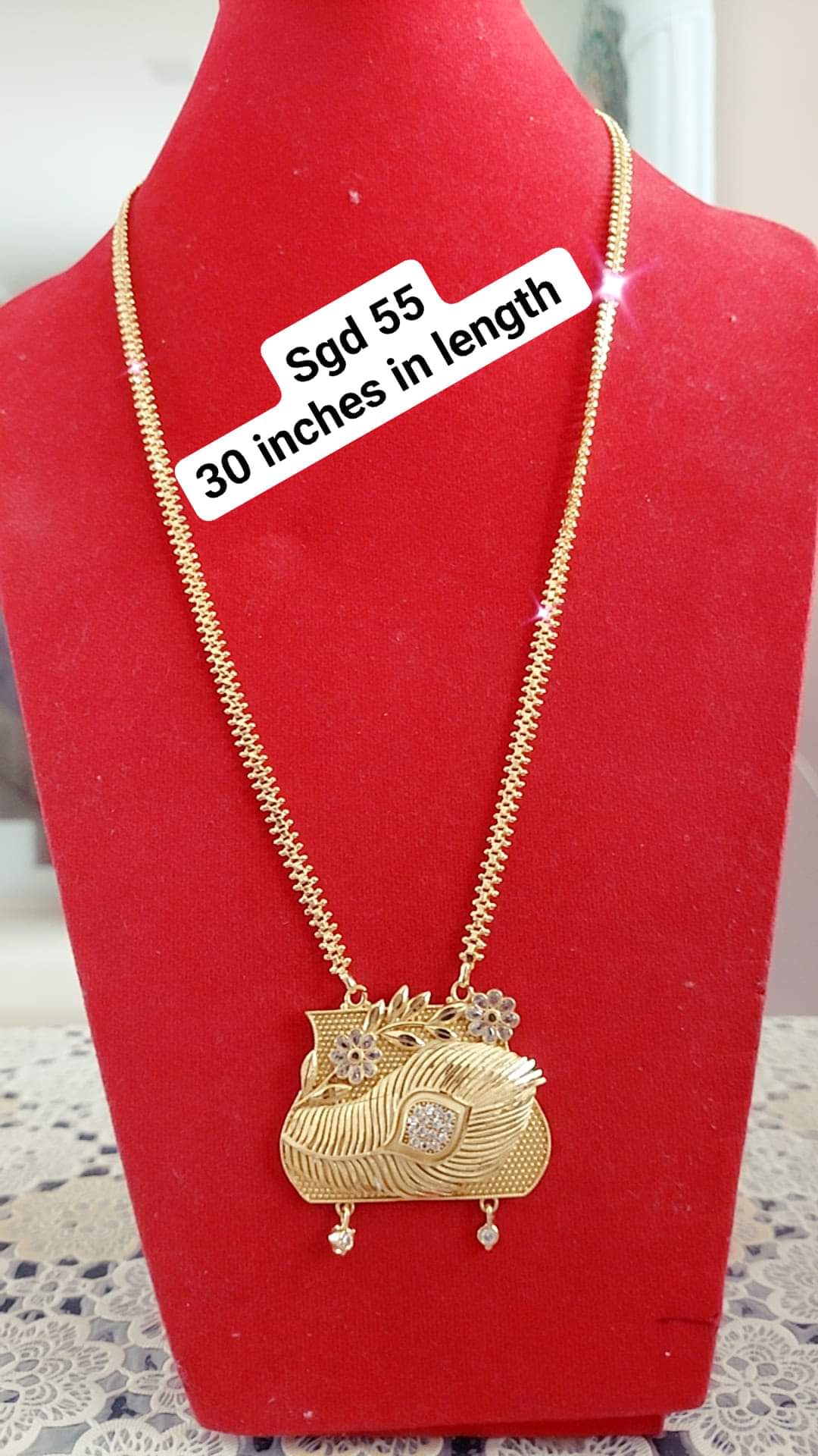 Peacock feather locket with 30 inches cz cut chain