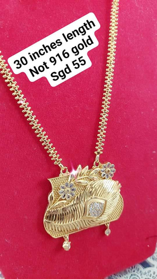 Peacock feather locket with 30 inches cz cut chain