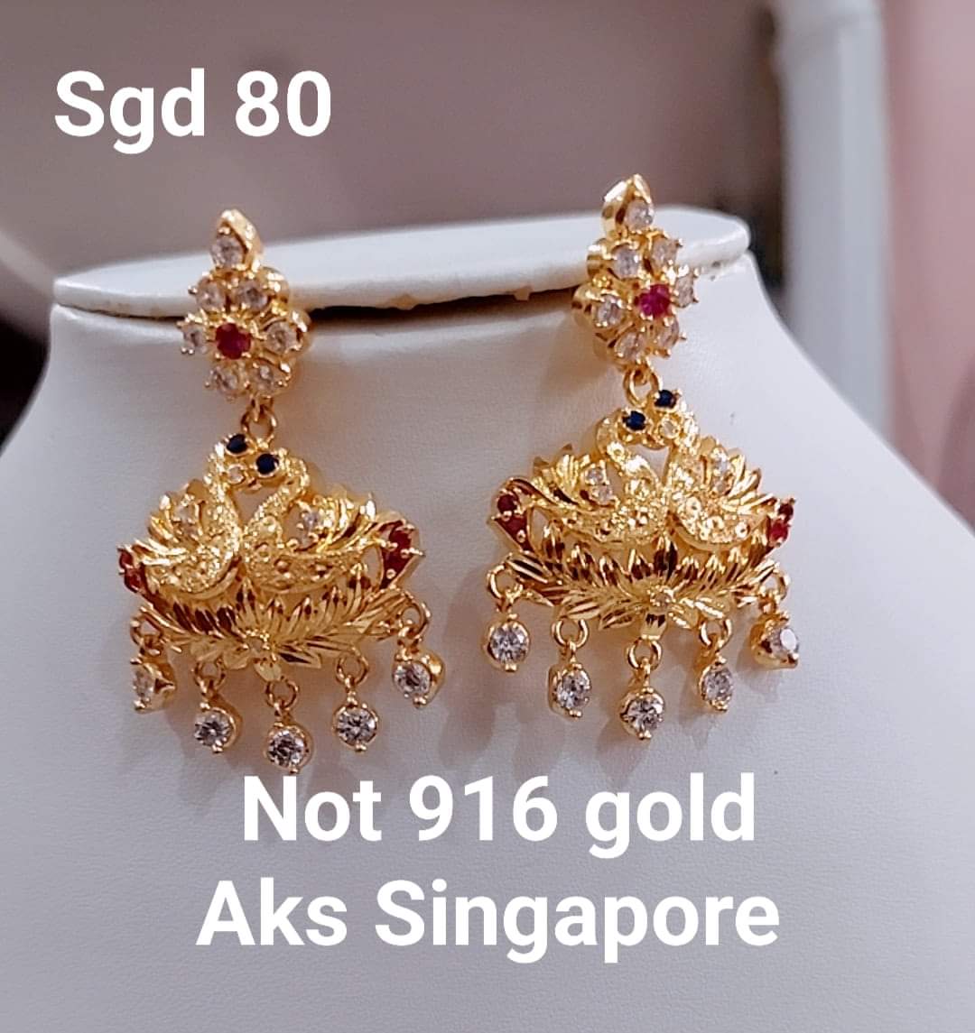 Exclusive peacock earrings