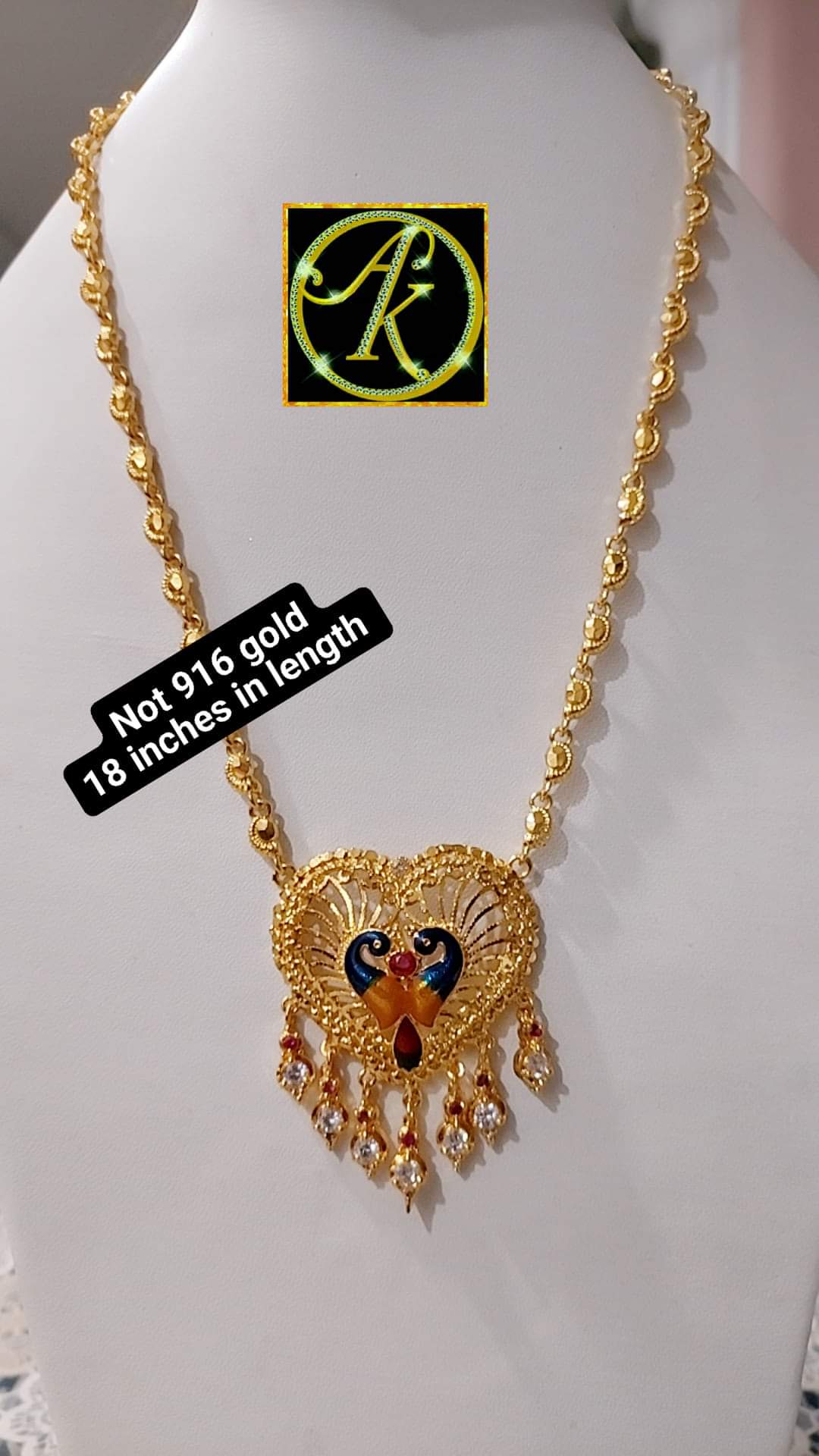 Paruppu chain with peacock locket