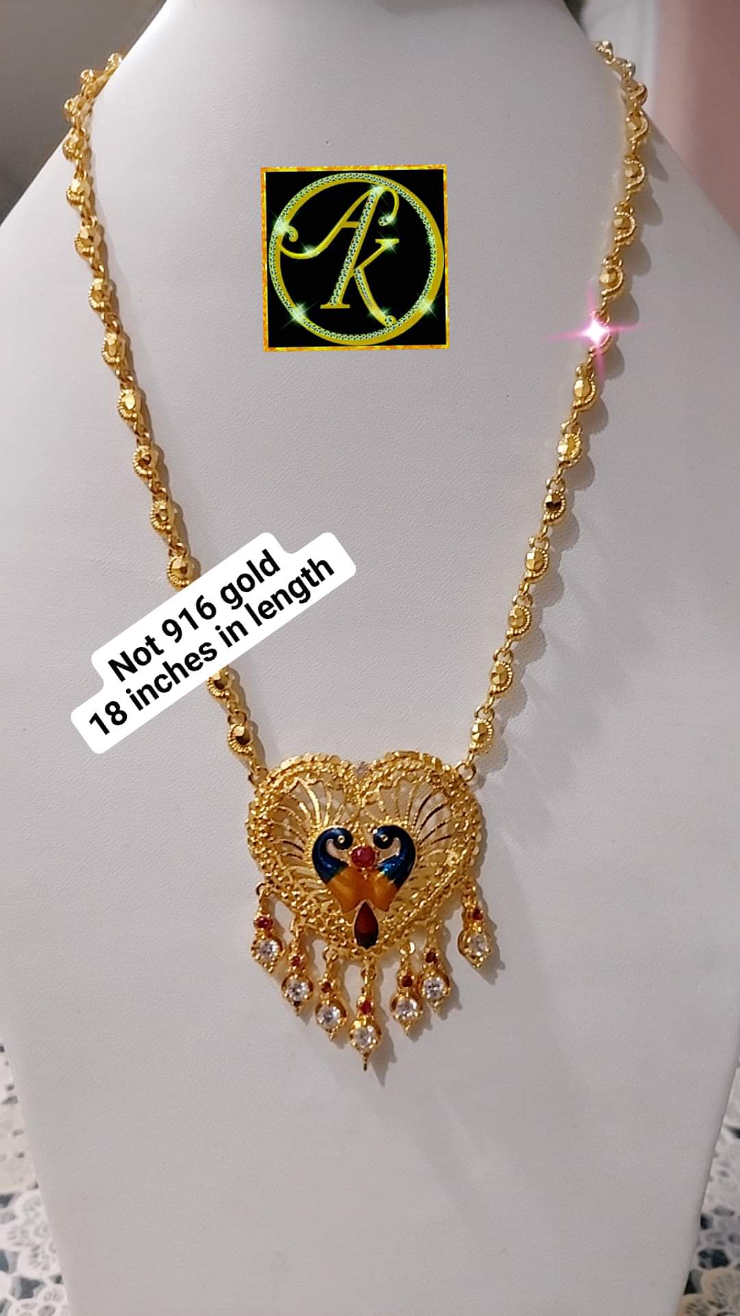 Paruppu chain with peacock locket