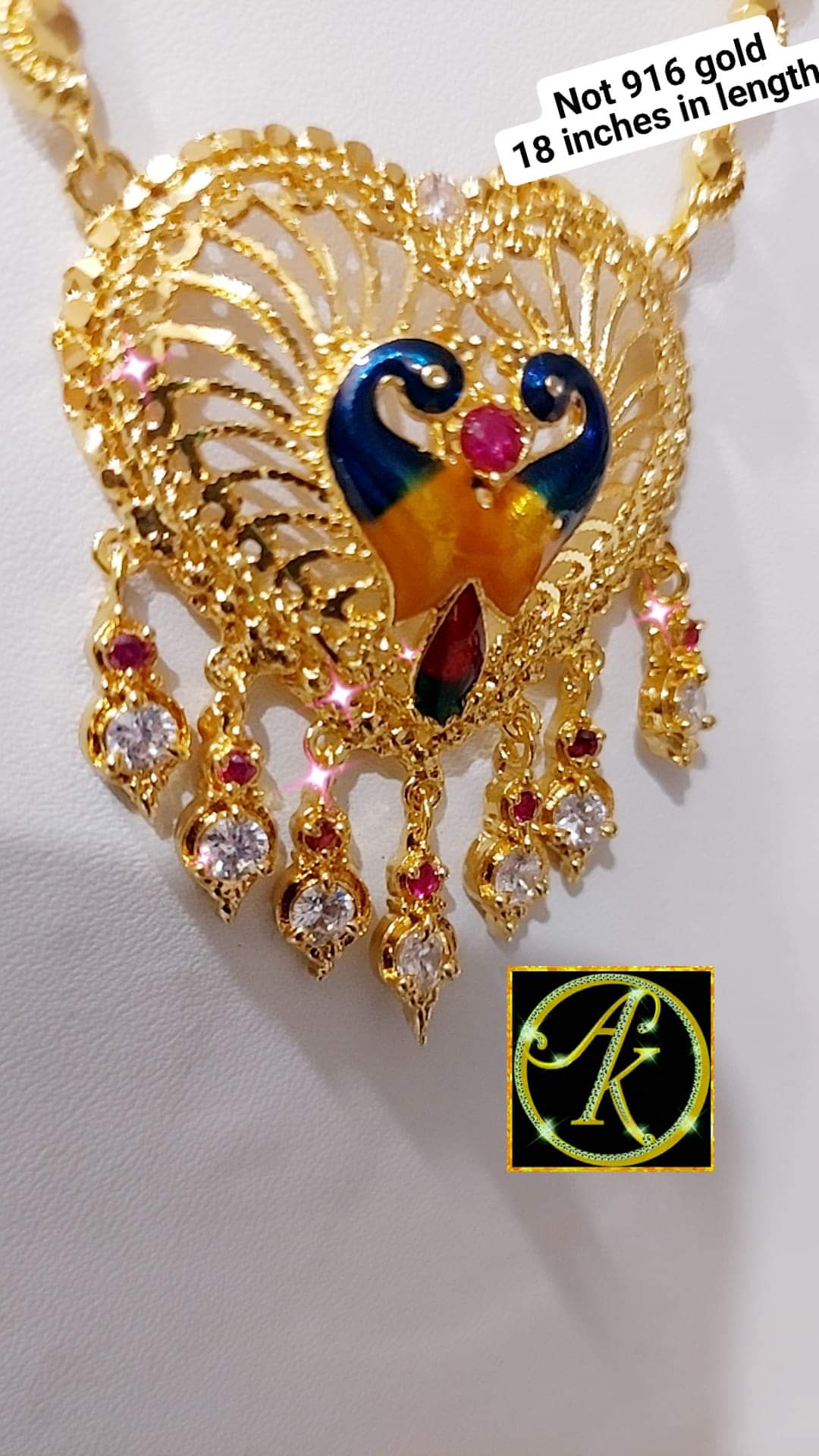 Paruppu chain with peacock locket