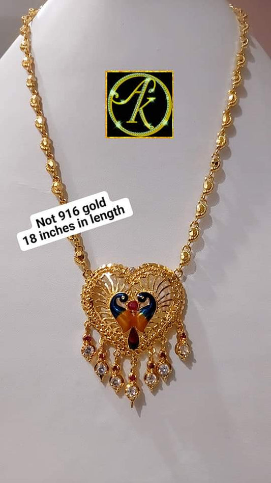 Paruppu chain with peacock locket