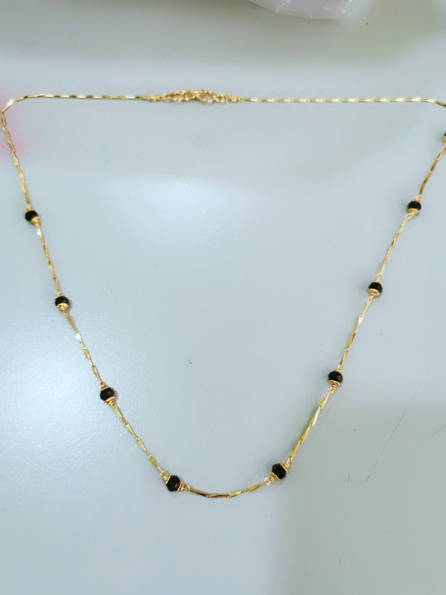 venthaya chain with black beads