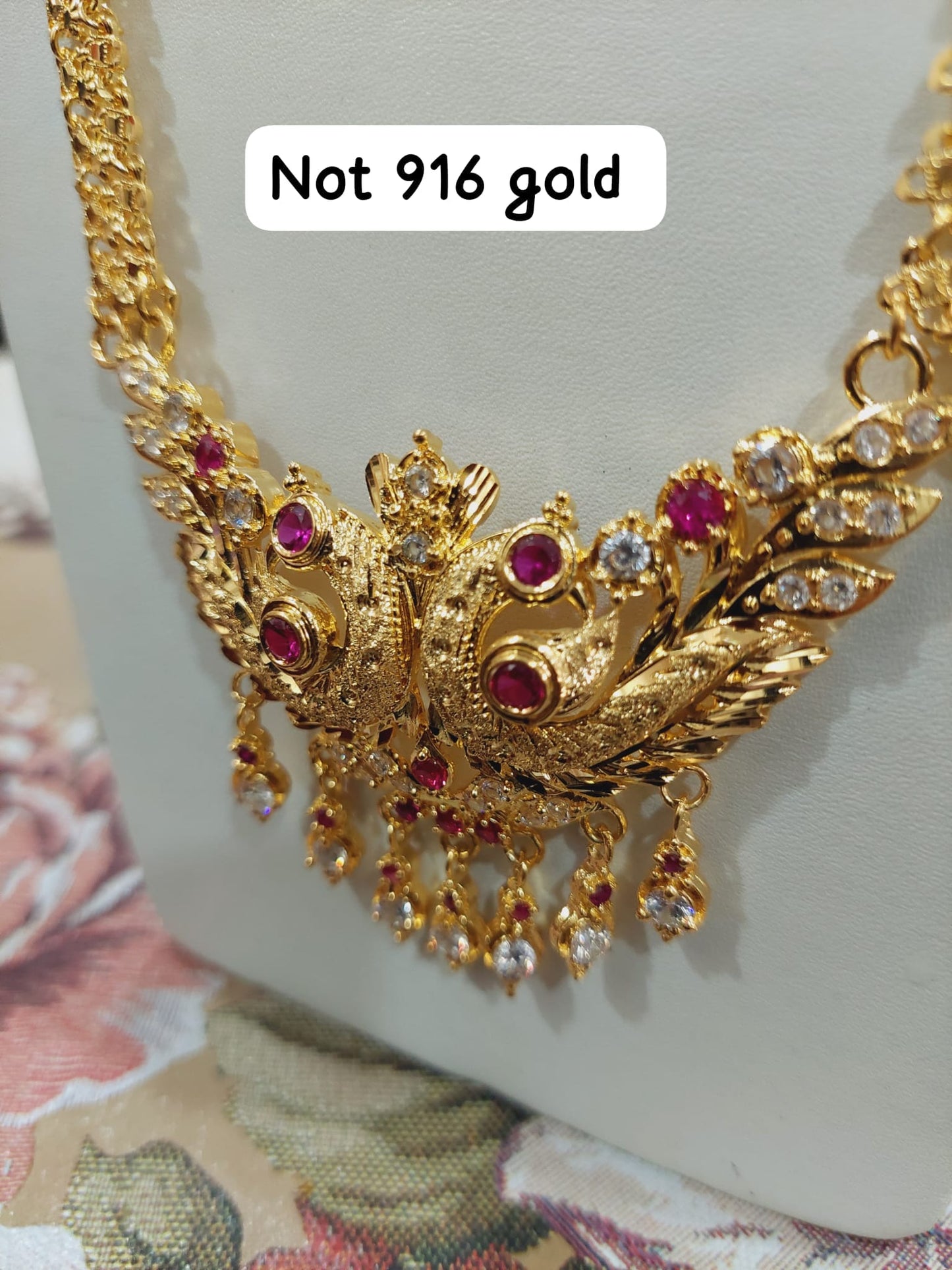 Code 333A. Peacock maalai 28 inches not 916 gold.