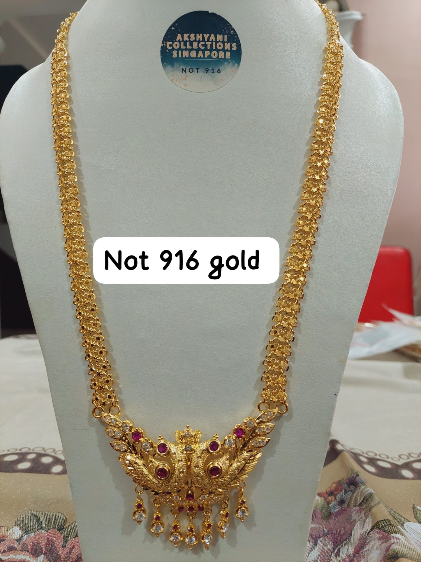 Code 333A. Peacock maalai 28 inches not 916 gold.