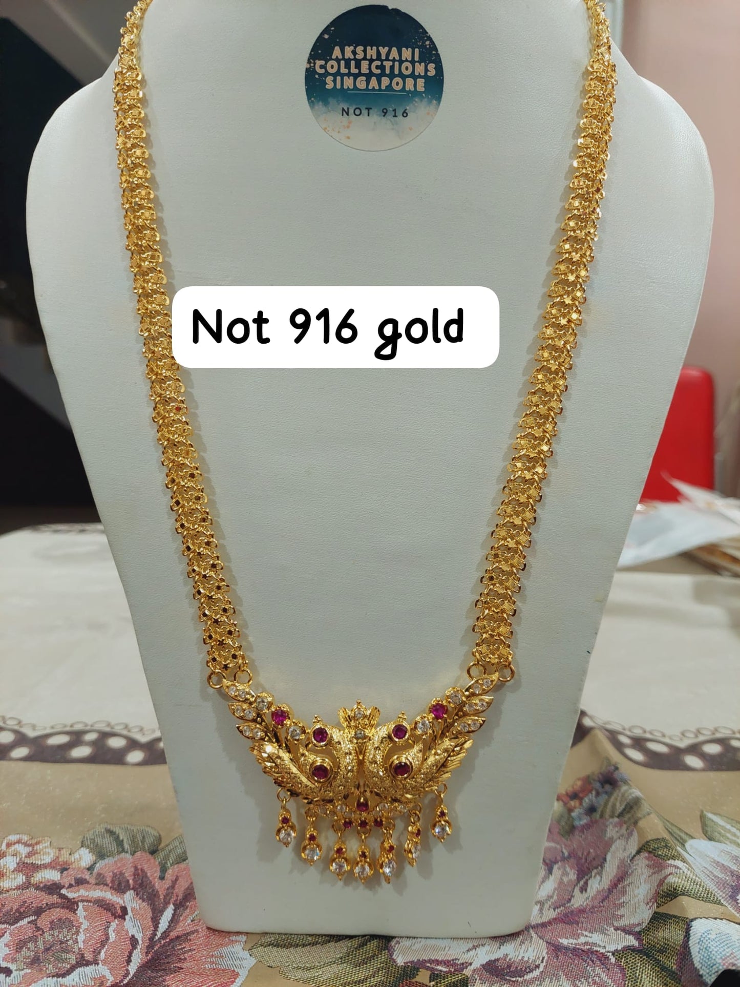 Code 333A. Peacock maalai 28 inches not 916 gold.