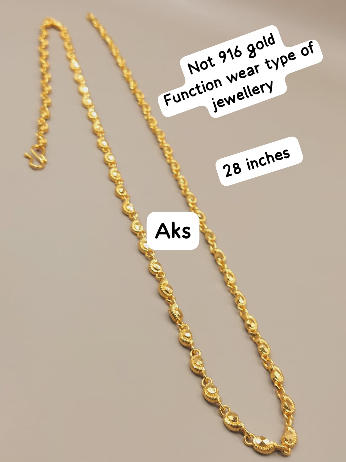 28 inches length paruppu chain. Not 916 gold ( read description) code 33E. Nickel free