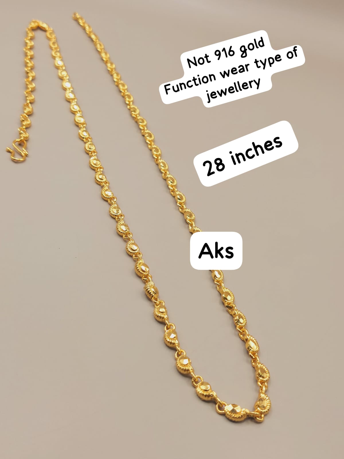 28 inches length paruppu chain. Not 916 gold ( read description) code 33E. Nickel free