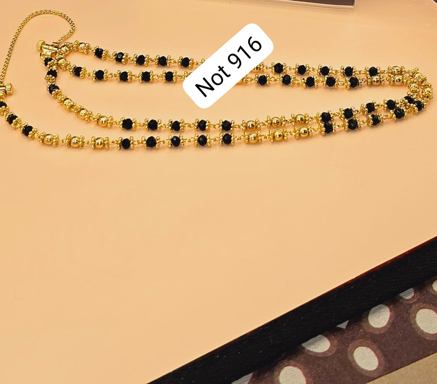 Black beads thalikodi with 3 inches extension to wear your own thali items. Not 916 gold. Function wear type