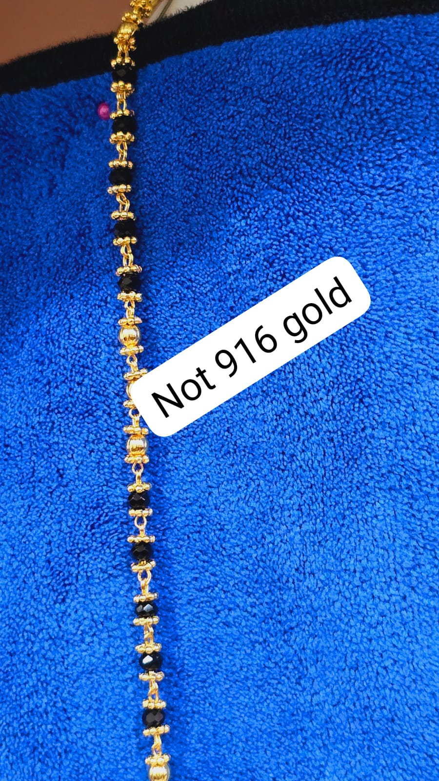 Black beads thalikodi with 3 inches extension to wear your own thali items. Not 916 gold. Function wear type