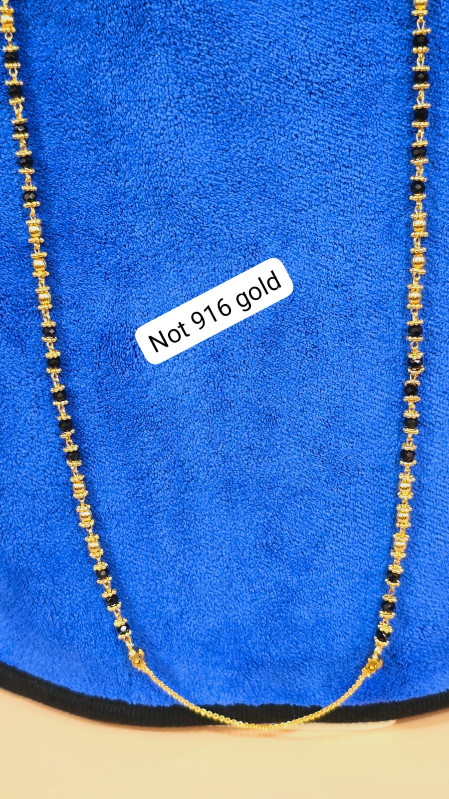 Black beads thalikodi with 3 inches extension to wear your own thali items. Not 916 gold. Function wear type