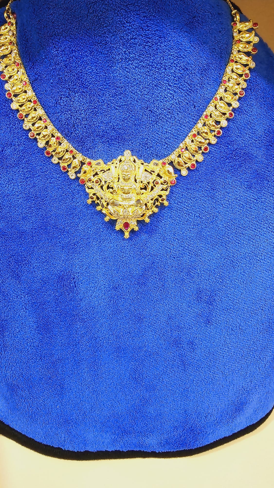 Mango chain with mahalakshkmi ( 18 inches code 73. Not 916 gold. Exclusive piece selection. Non exchangeable