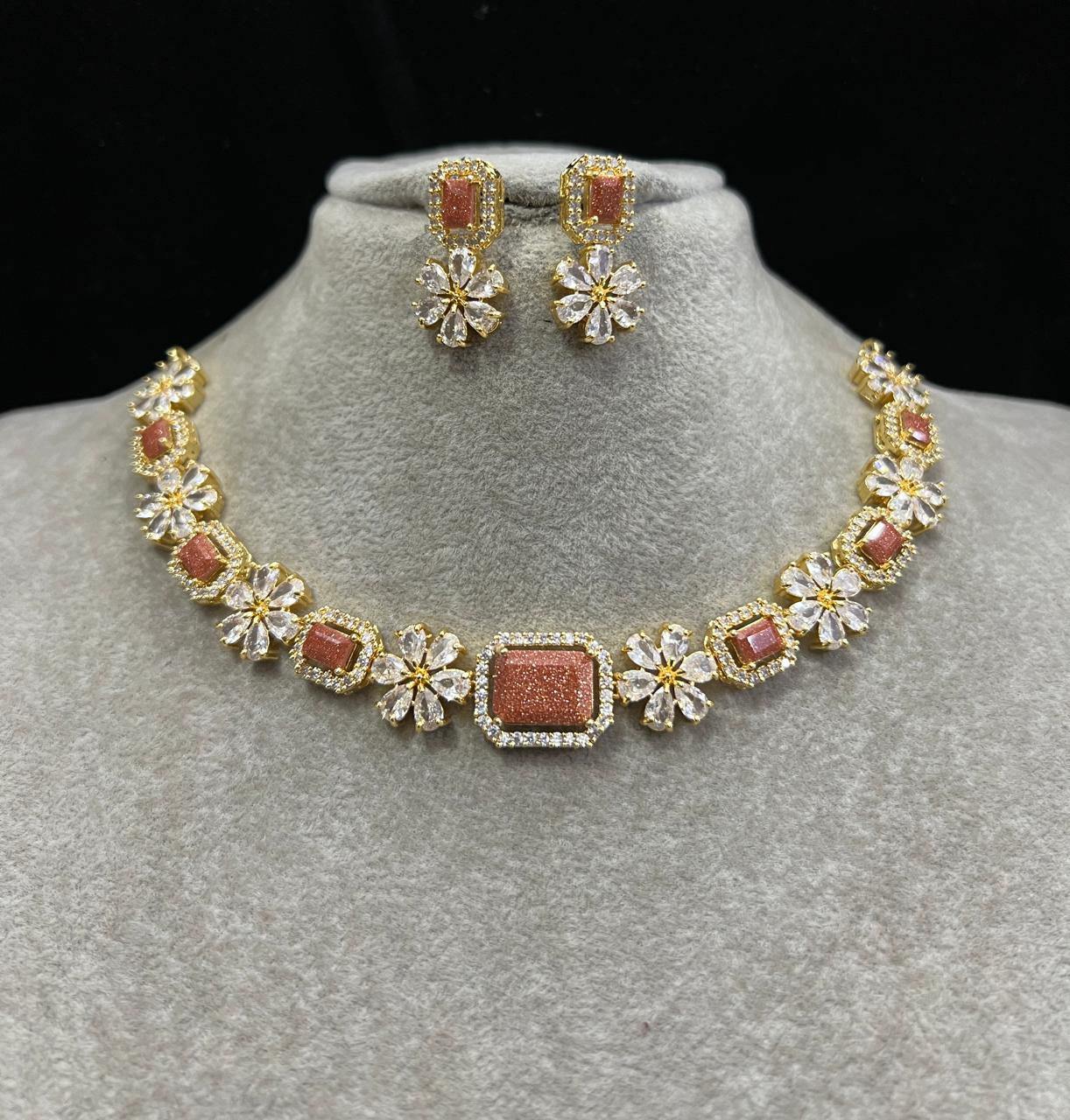 Ad brown glitter coral with earrings.  Not 916 gold. Chain rings behind . Code 7867