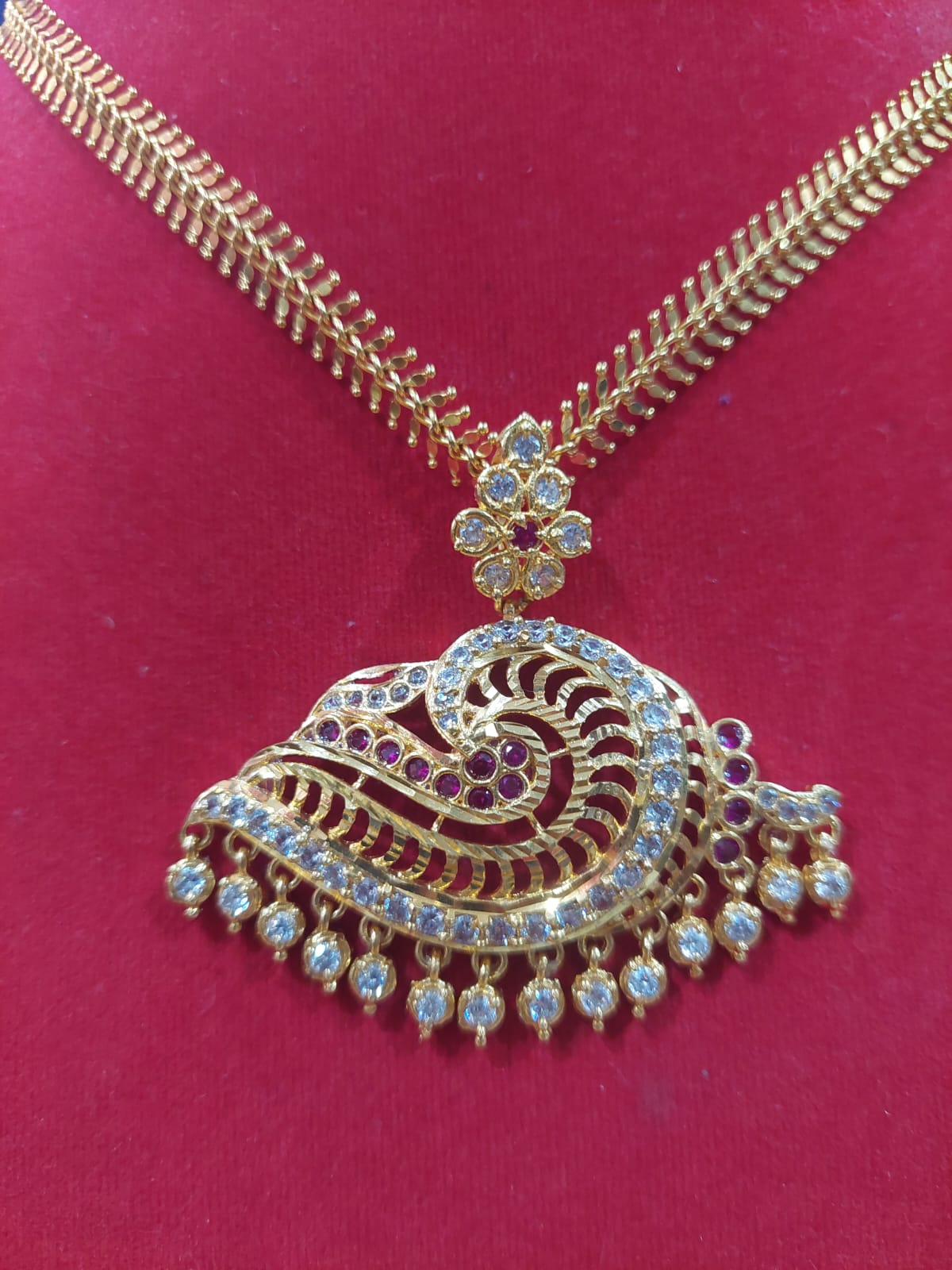 CHAIN WITH PEACOCK LOCKET