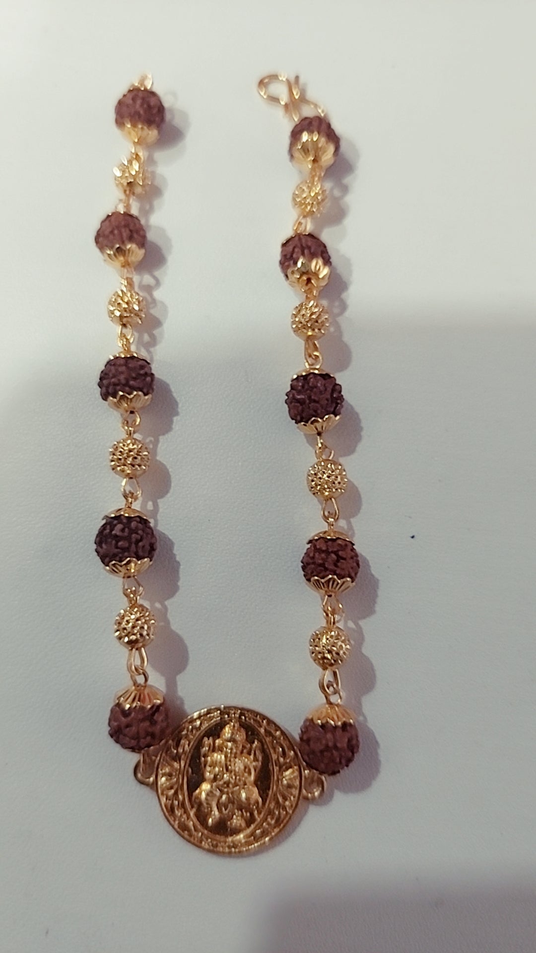 RUDHARKSHA BRACELET NOT 916 WITH VINAYAGAR LOCKET