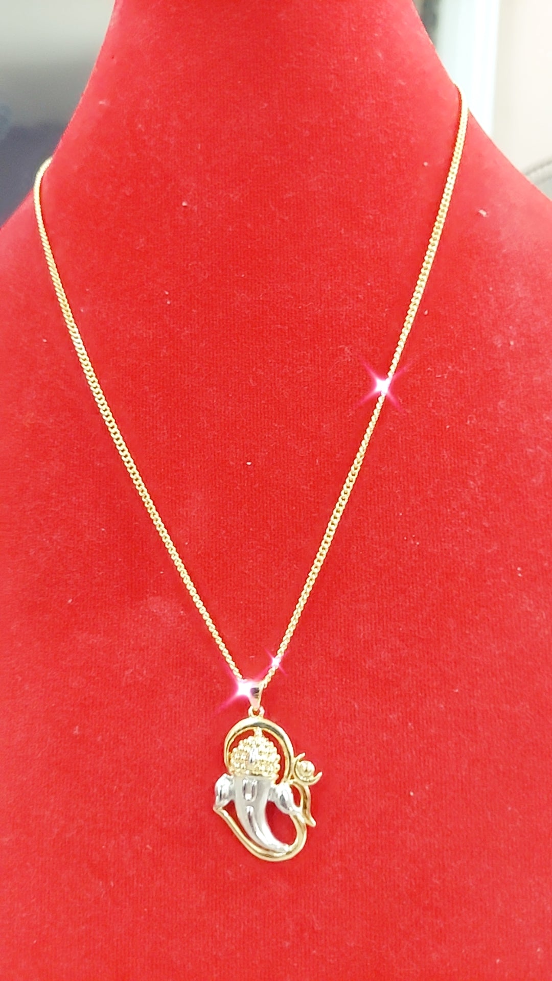 Ganesha 2 tone locket with chain not 916 gold